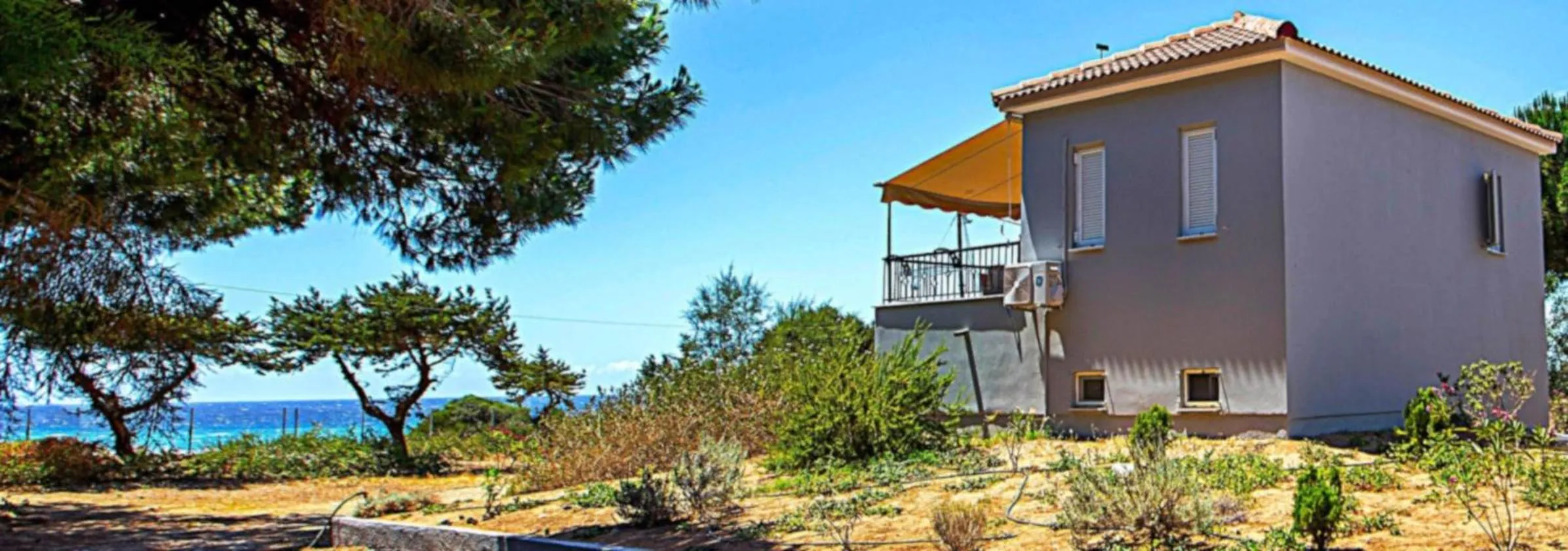 Property building in Romanos Beach Villas