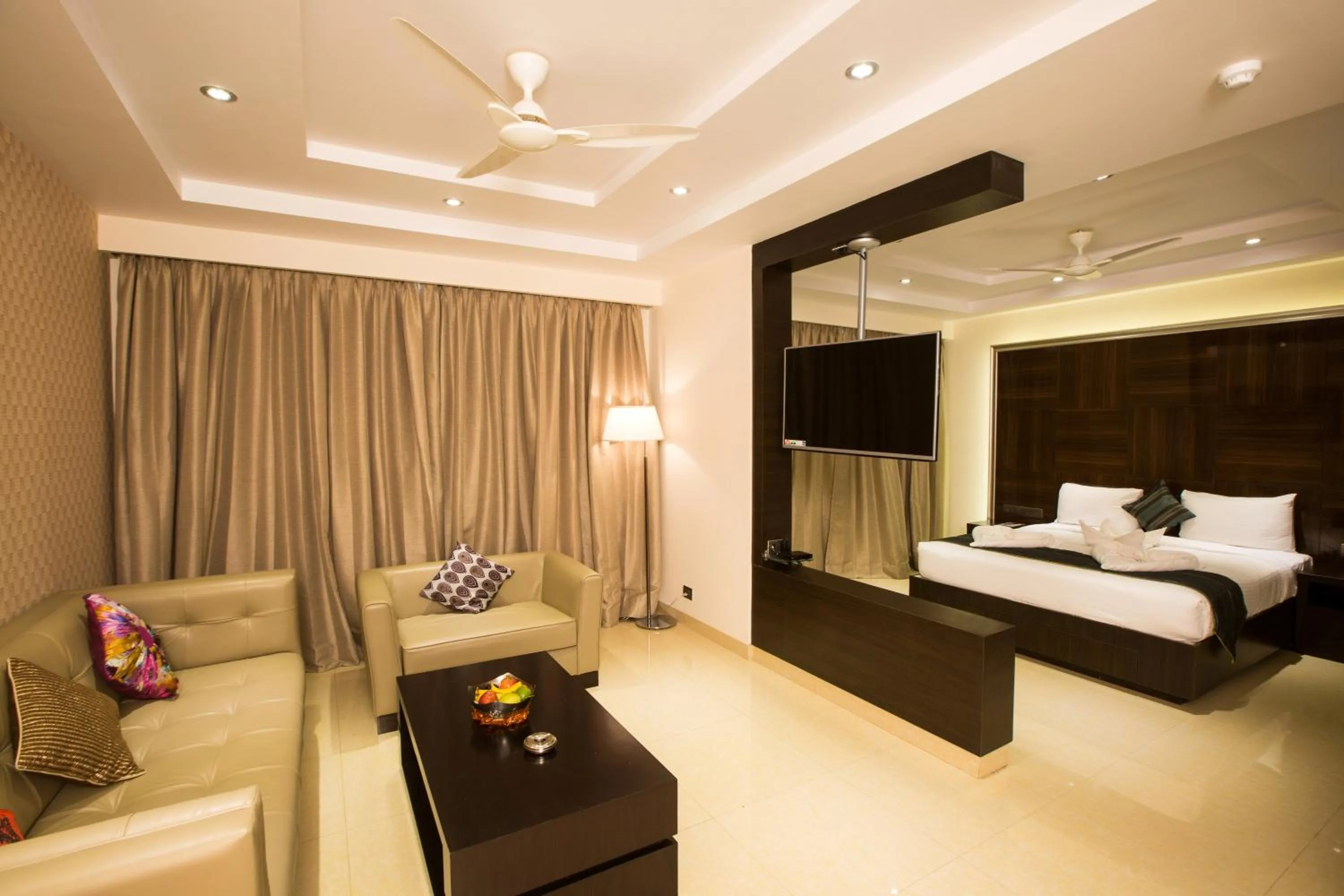 Living room, Bed in Hotel Grand Visava Lonavala