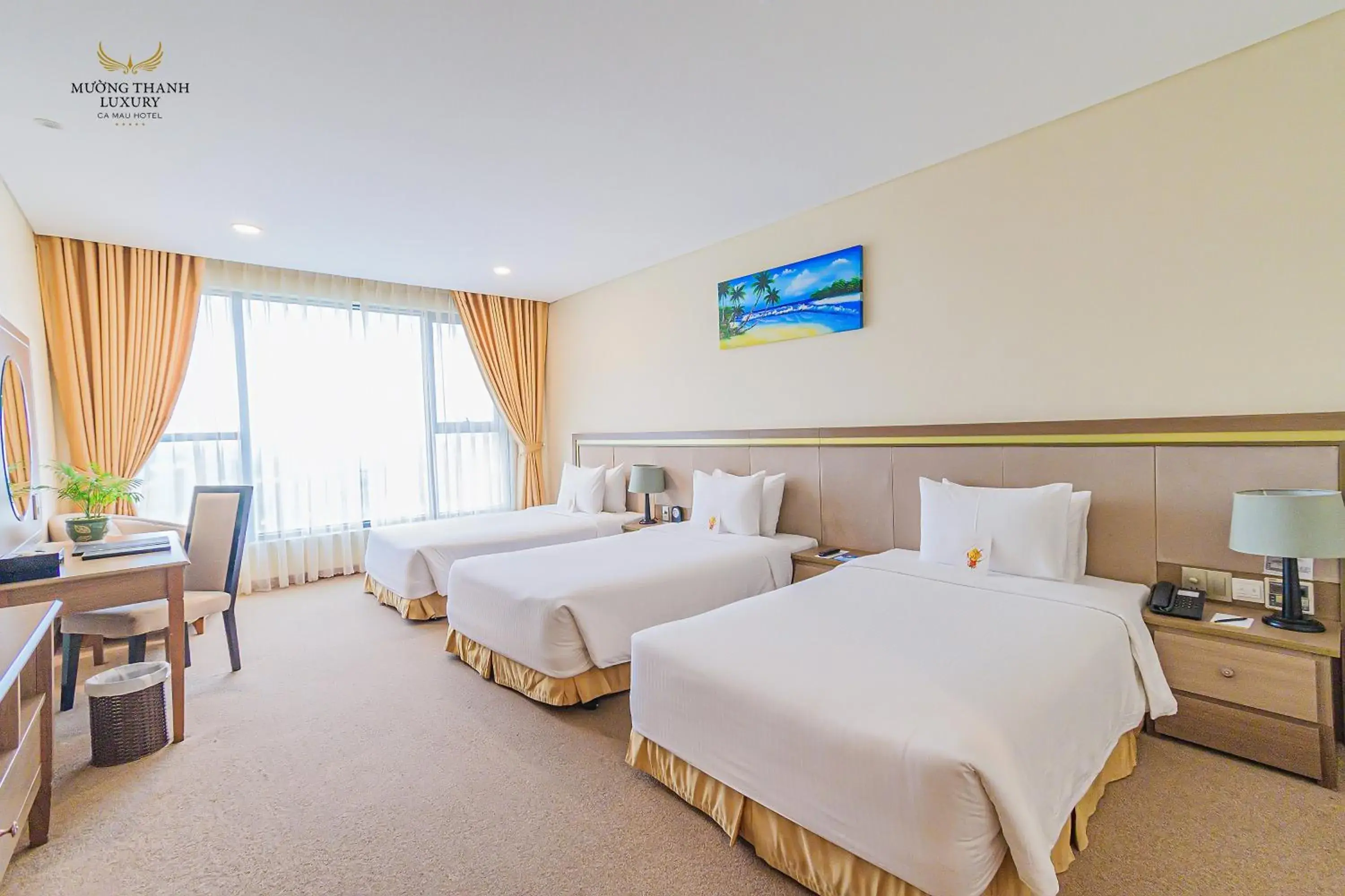 Deluxe Triple Room in Muong Thanh Luxury Ca Mau Hotel Deluxe Triple Room in Muong Thanh Luxury Ca Mau Hotel