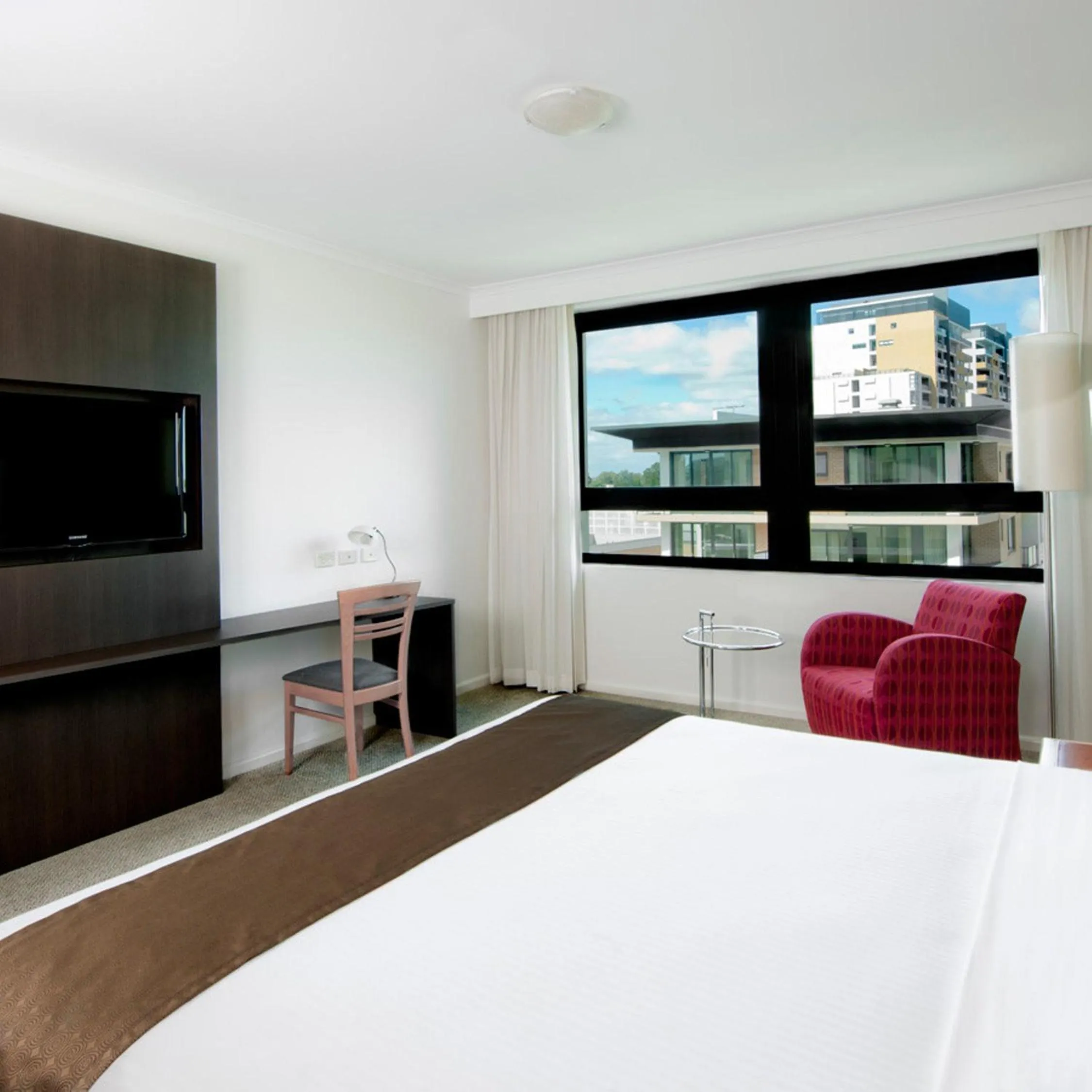 Photo of the whole room, Bed in Mantra Parramatta