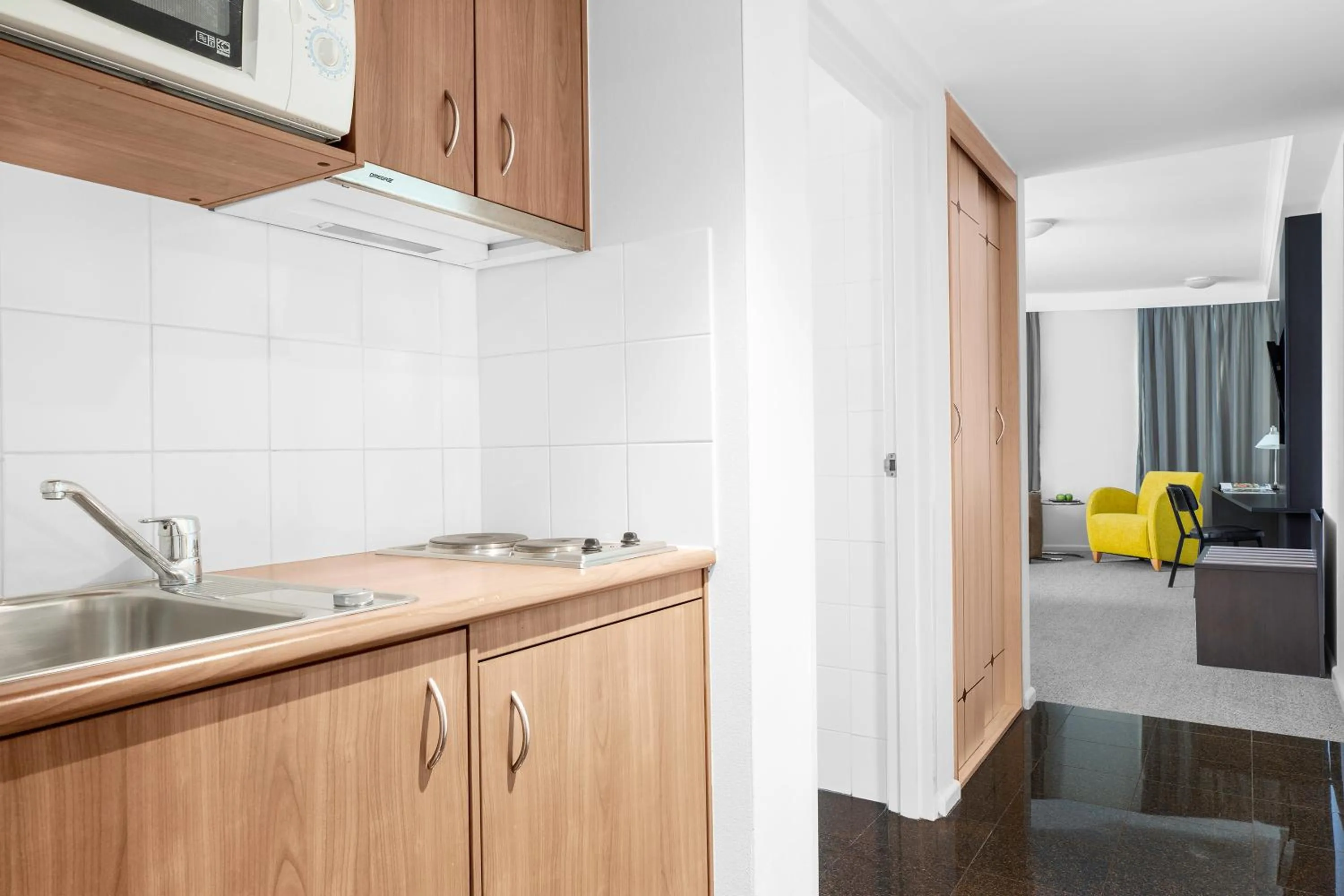 Kitchen or kitchenette in Mantra Parramatta