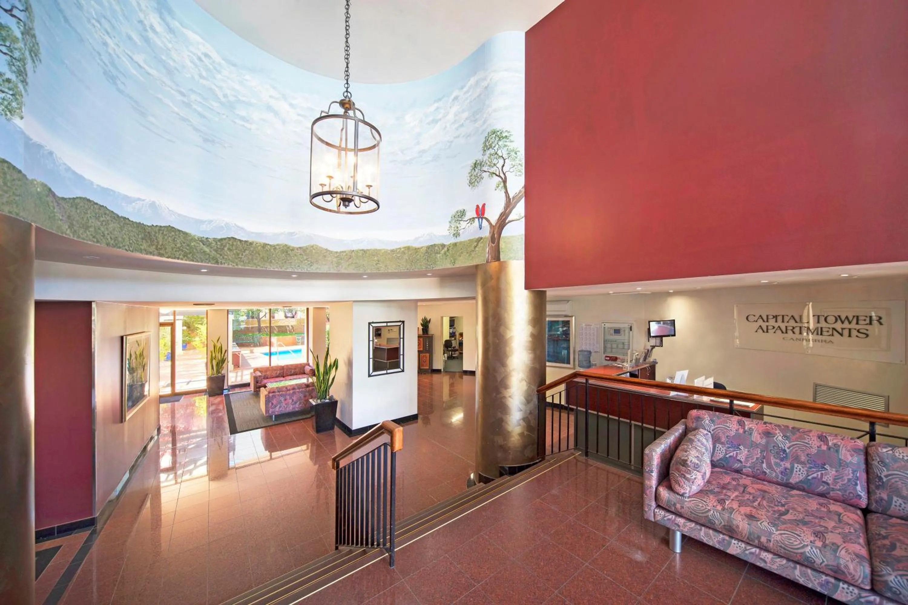 Lobby or reception, Bed in BreakFree Capital Tower Apartments