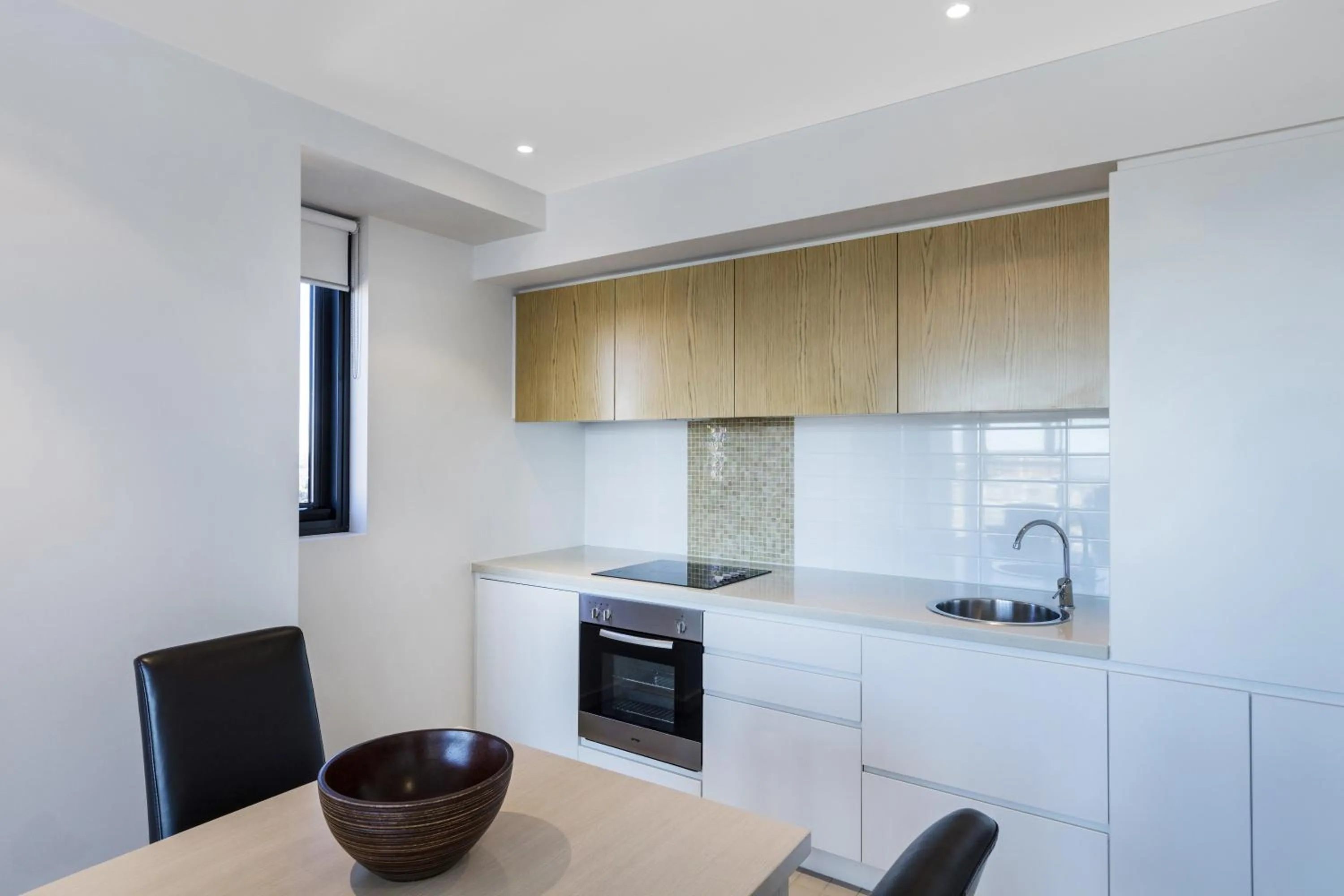Kitchen or kitchenette in iStay Precinct Adelaide