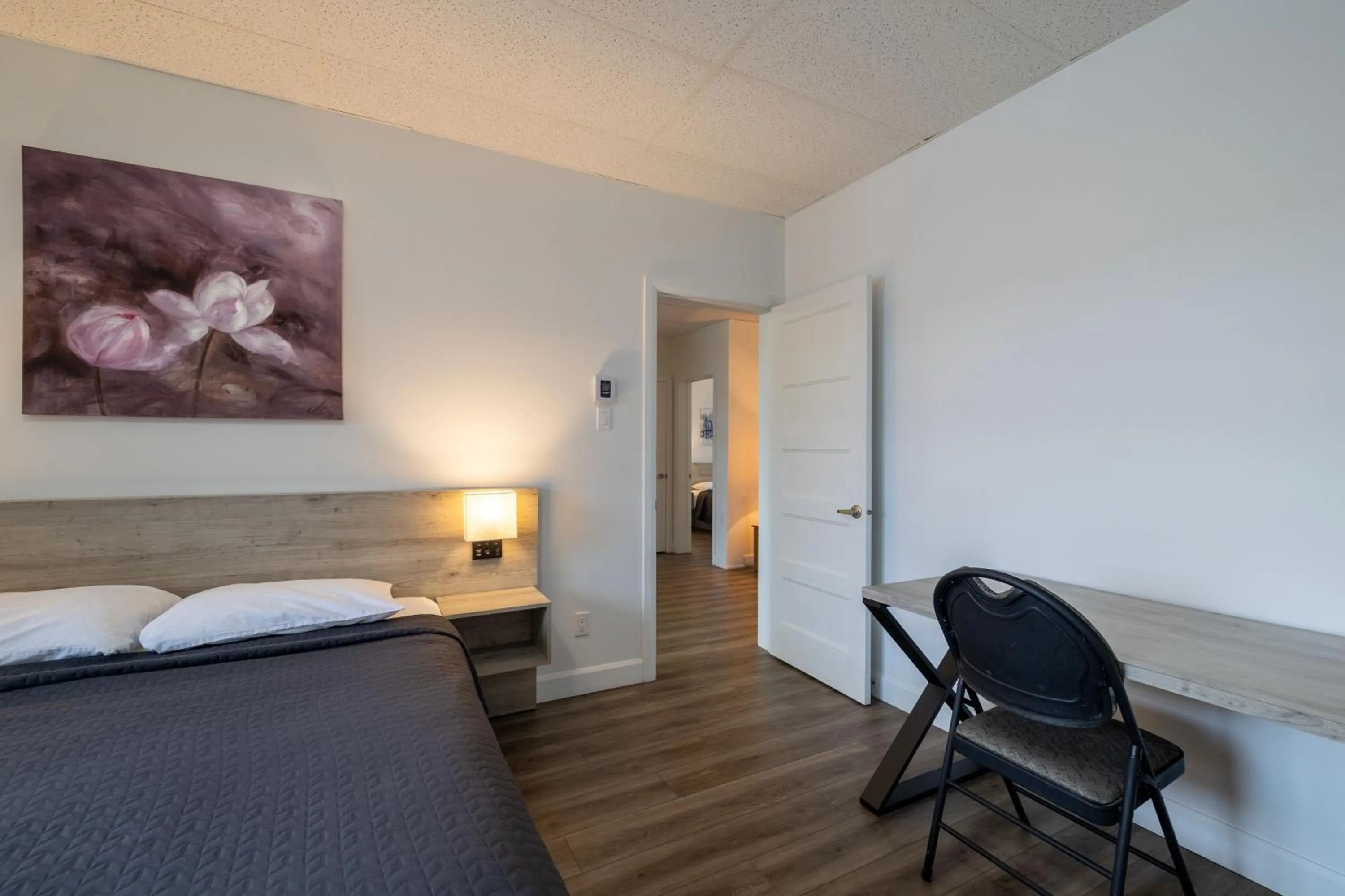 Bed in Motel Et Condo Chez Charley