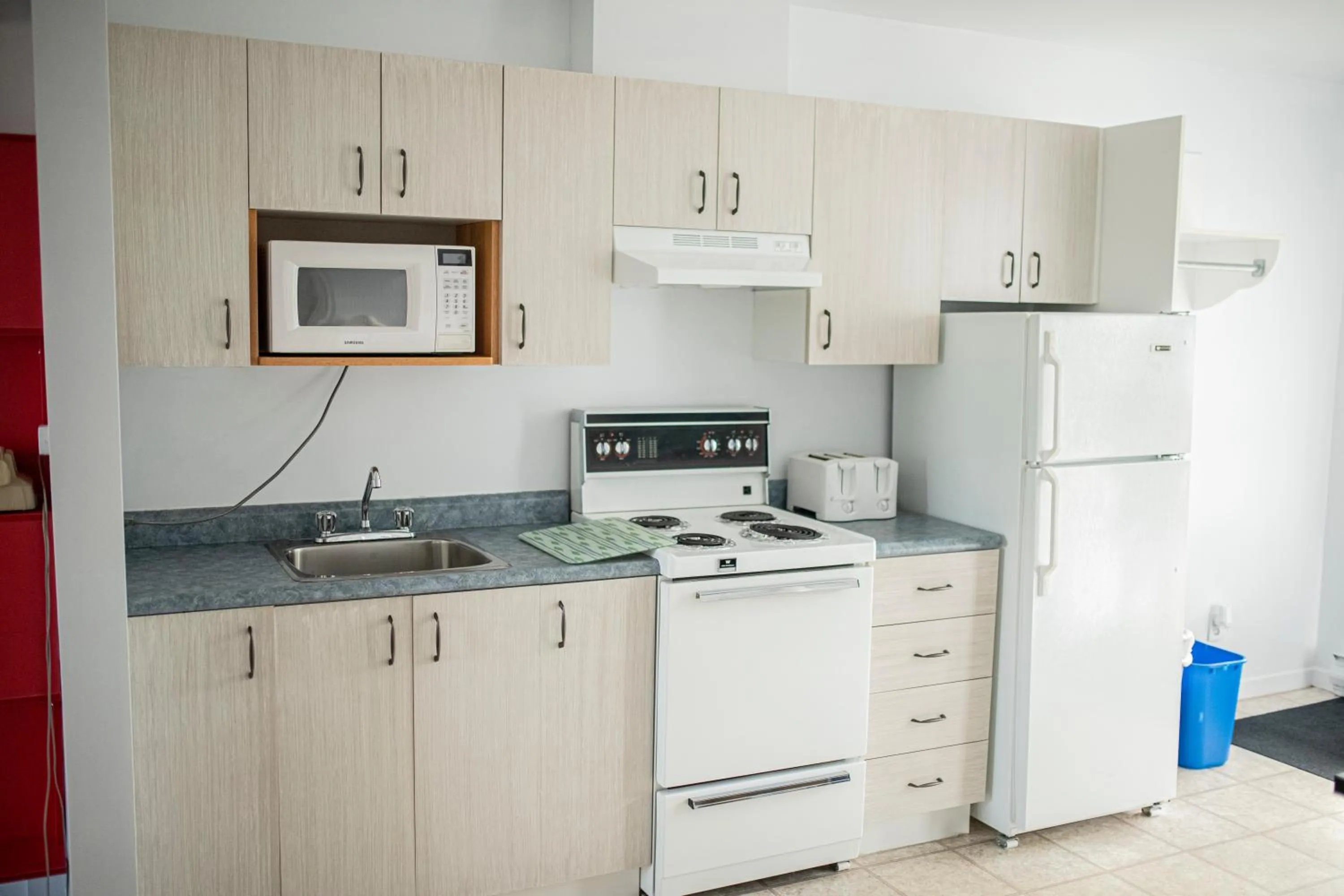 Kitchen or kitchenette in Motel Et Condo Chez Charley