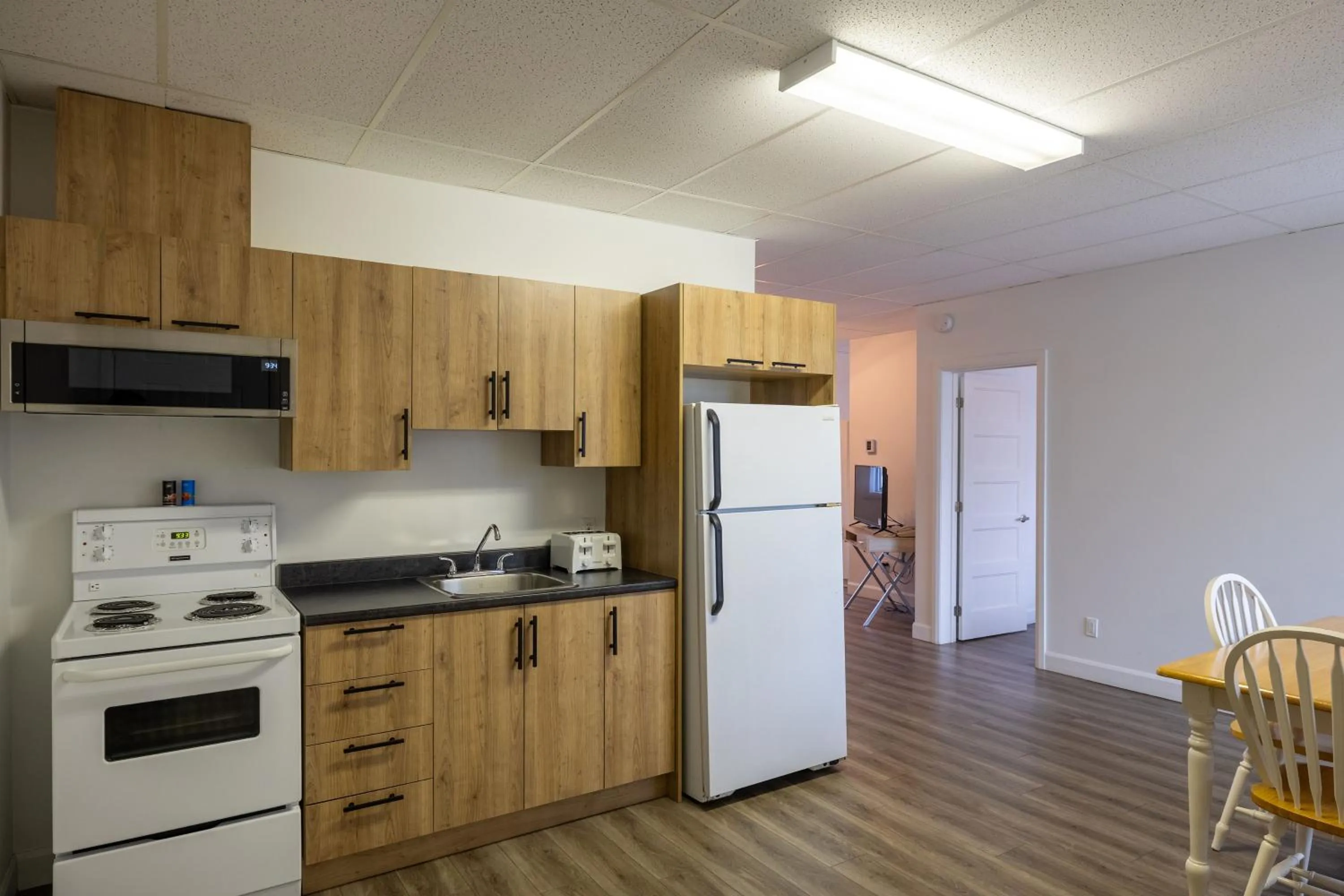 Kitchen or kitchenette in Motel Et Condo Chez Charley