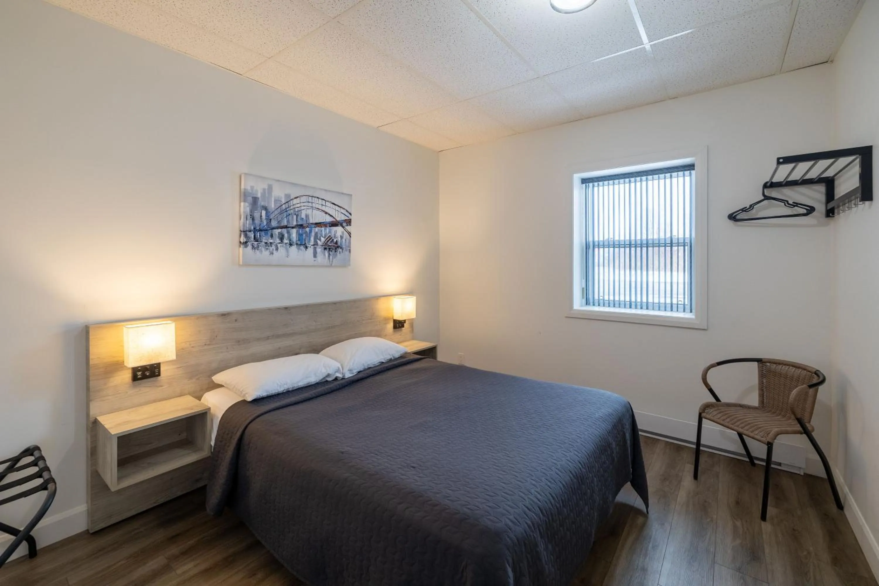 Bed in Motel Et Condo Chez Charley