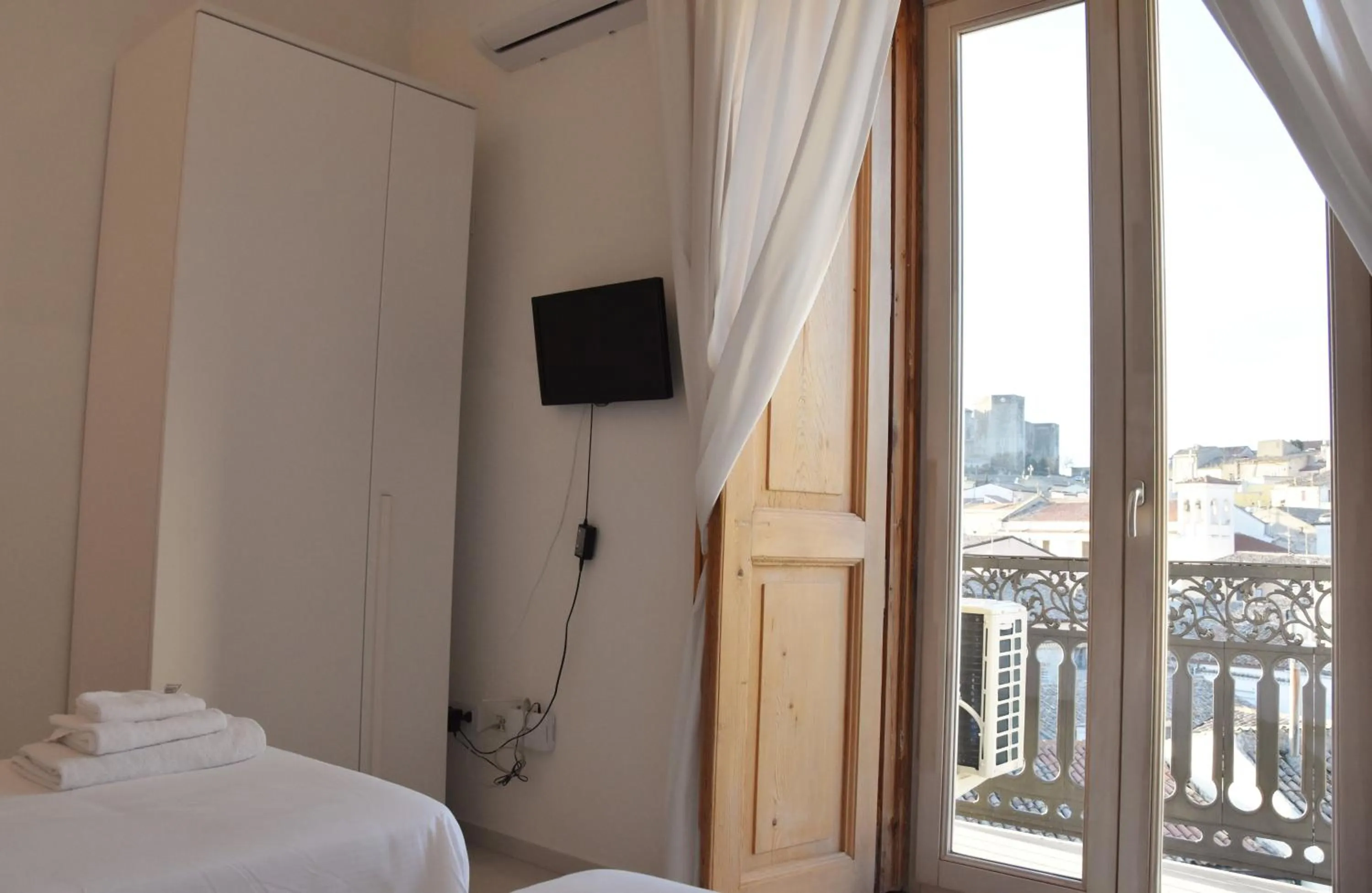 Photo of the whole room, Bed in La Casa nel Borgo Antico