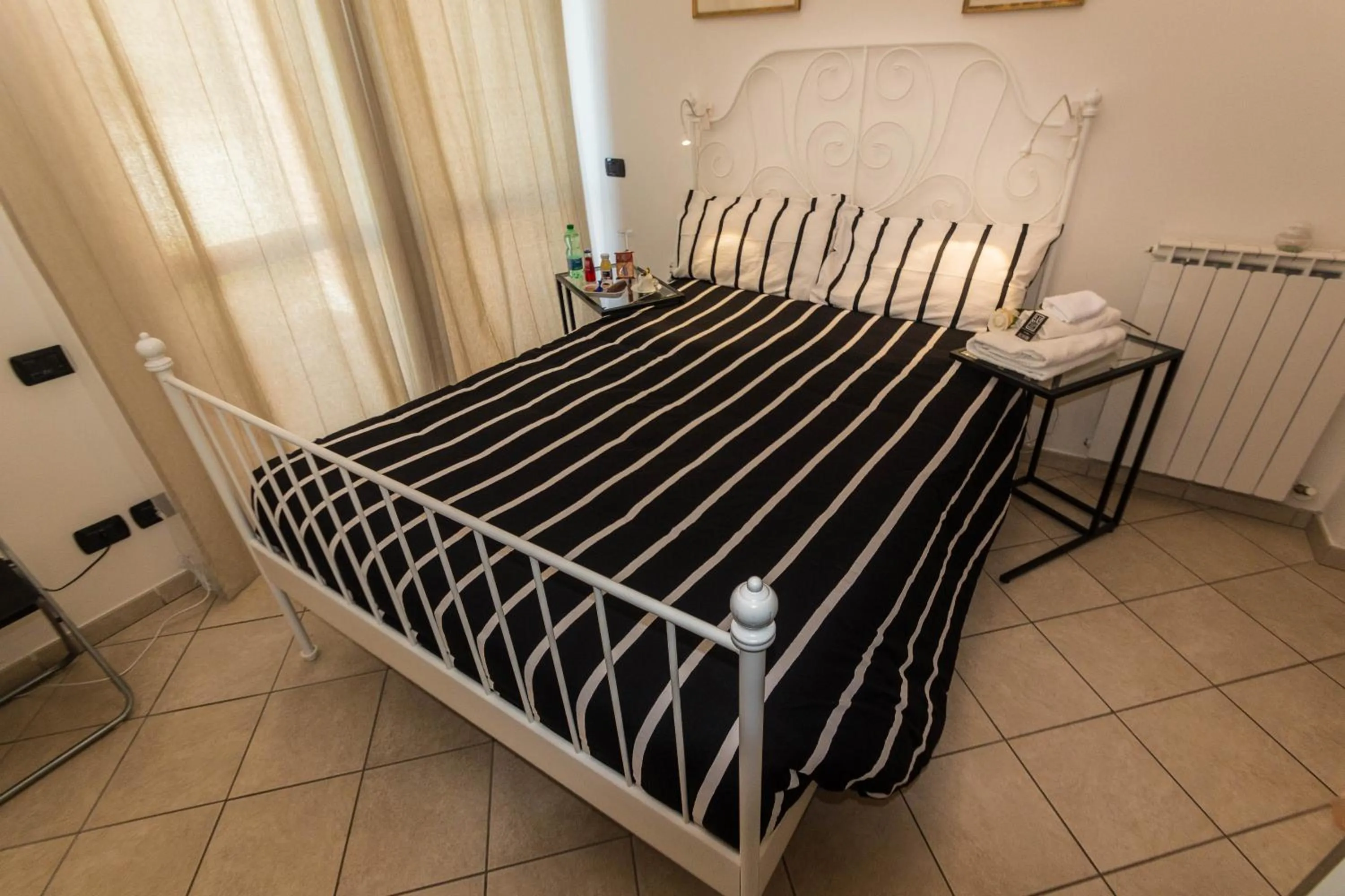 Bed in Leonardo Rome Holidays