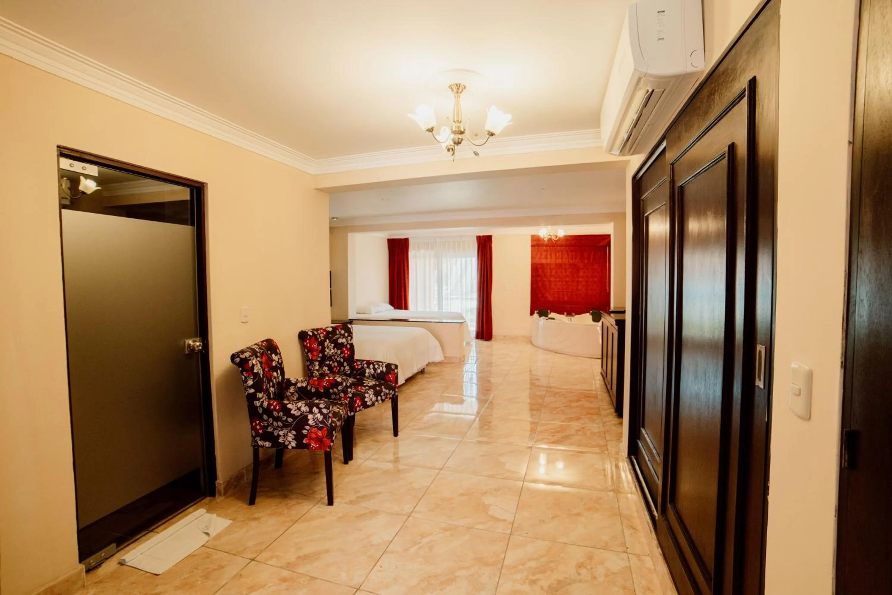 Living room, Bed in Hacienda San Juan Resort
