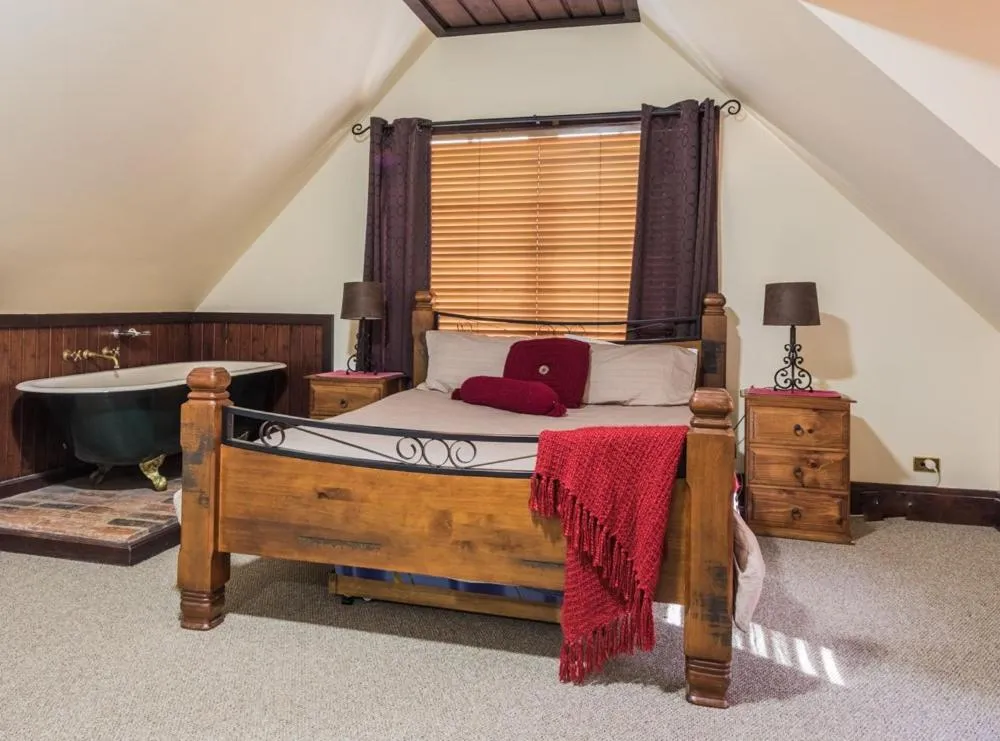 Bed in Gold Mine Guest House and Cafe