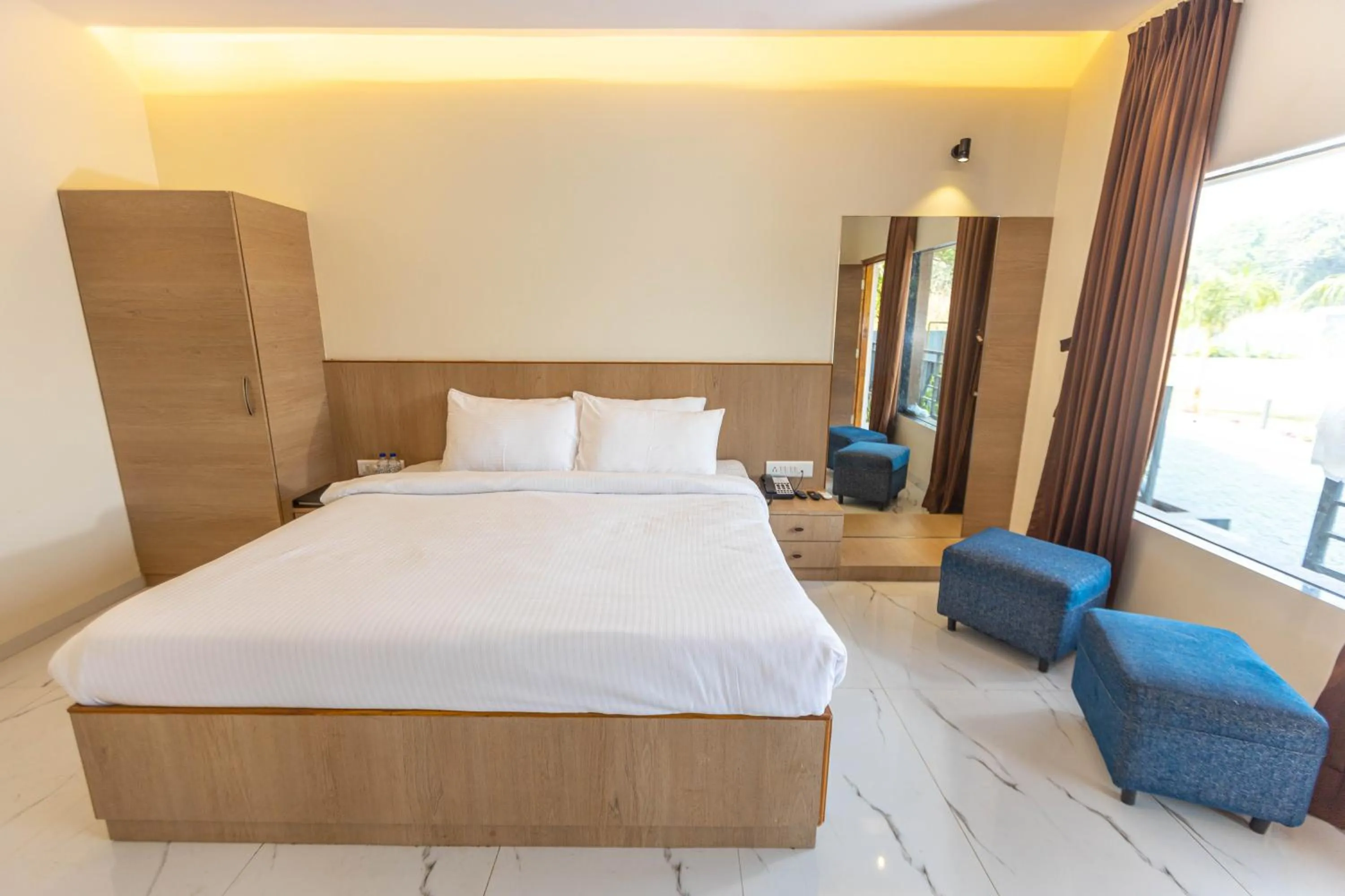 Bed in Pushp Vatika Resort & Lawns