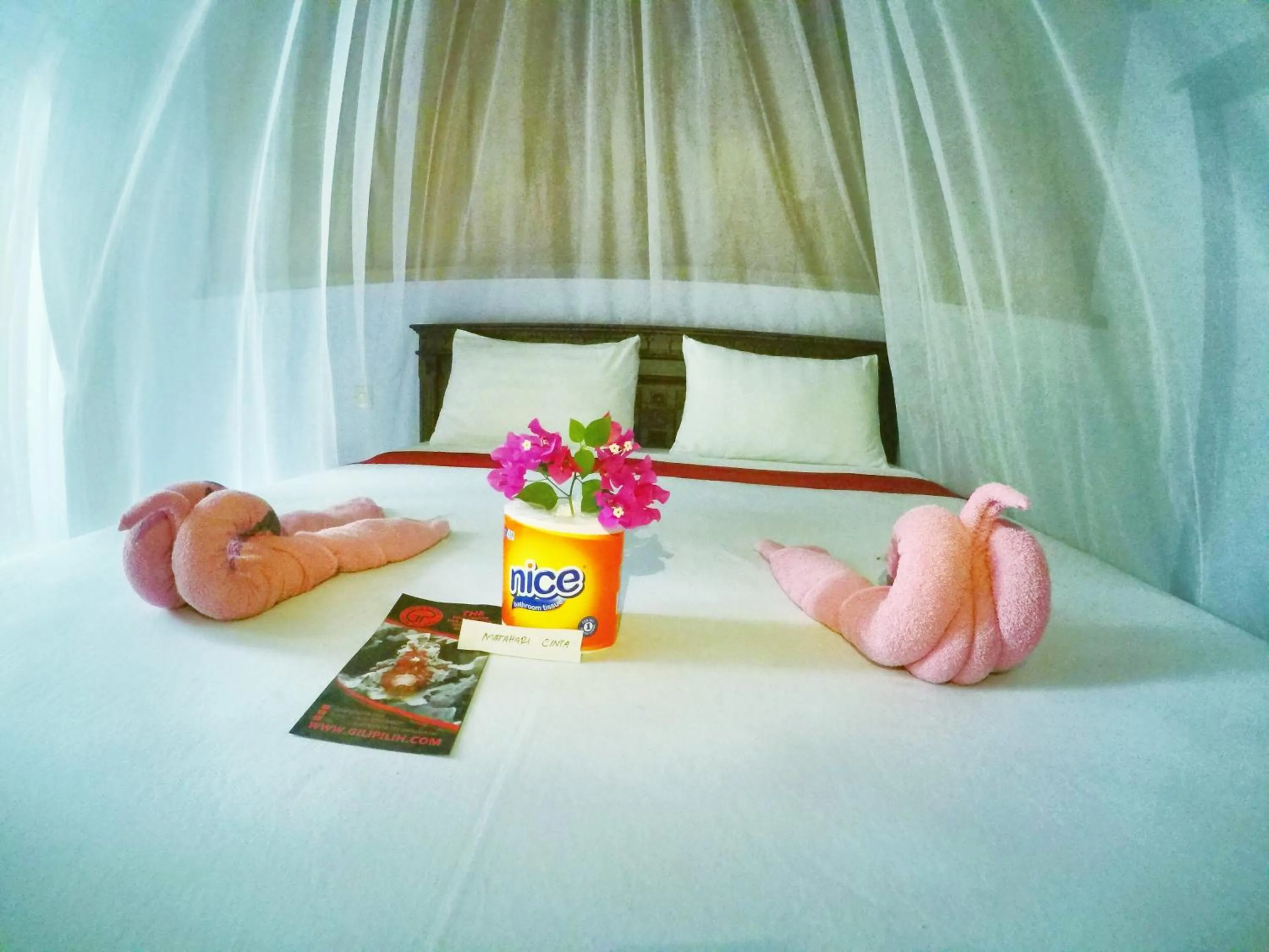 Bed in Ina Gili Guesthouse