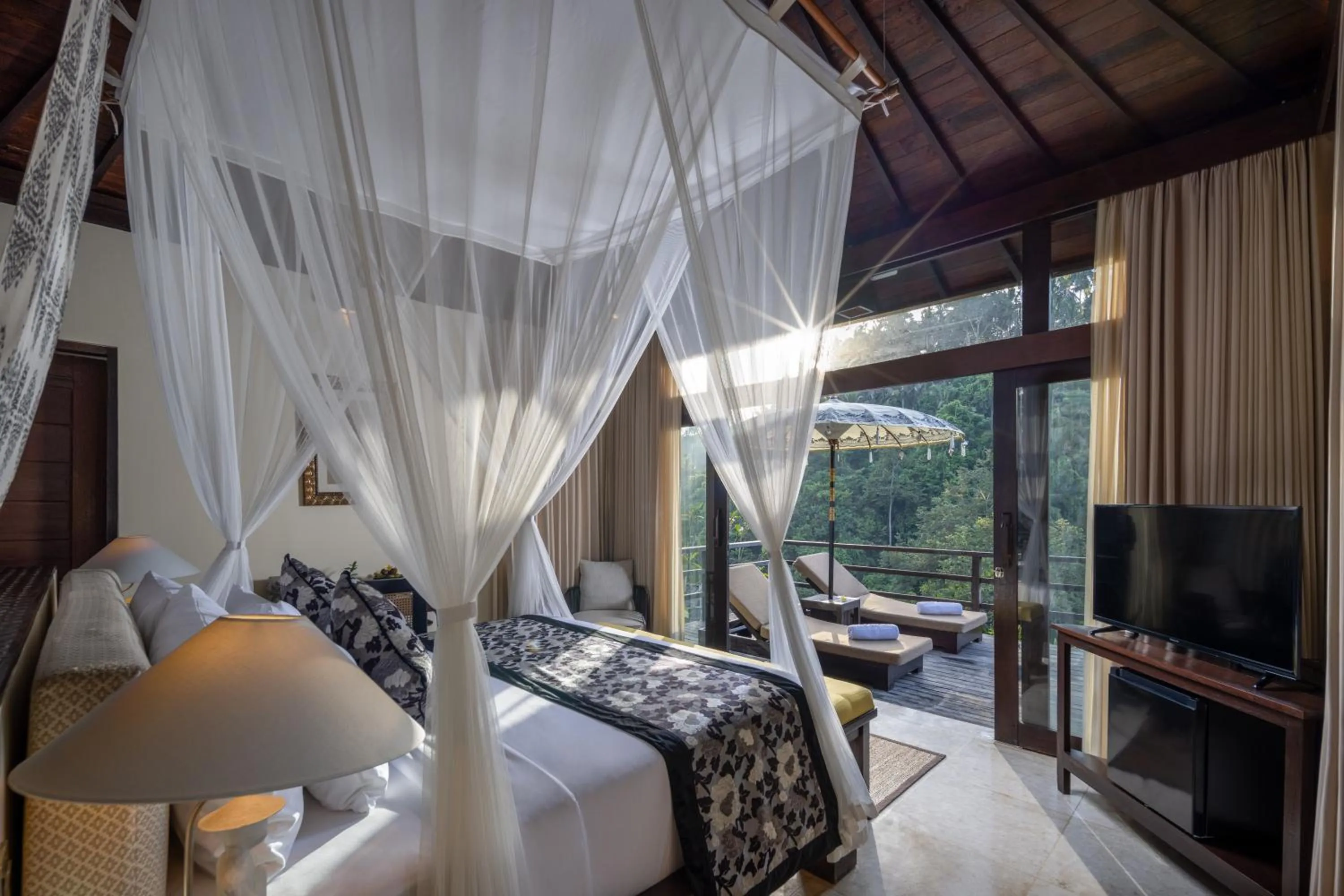 Bed in The Kayon Valley Resort