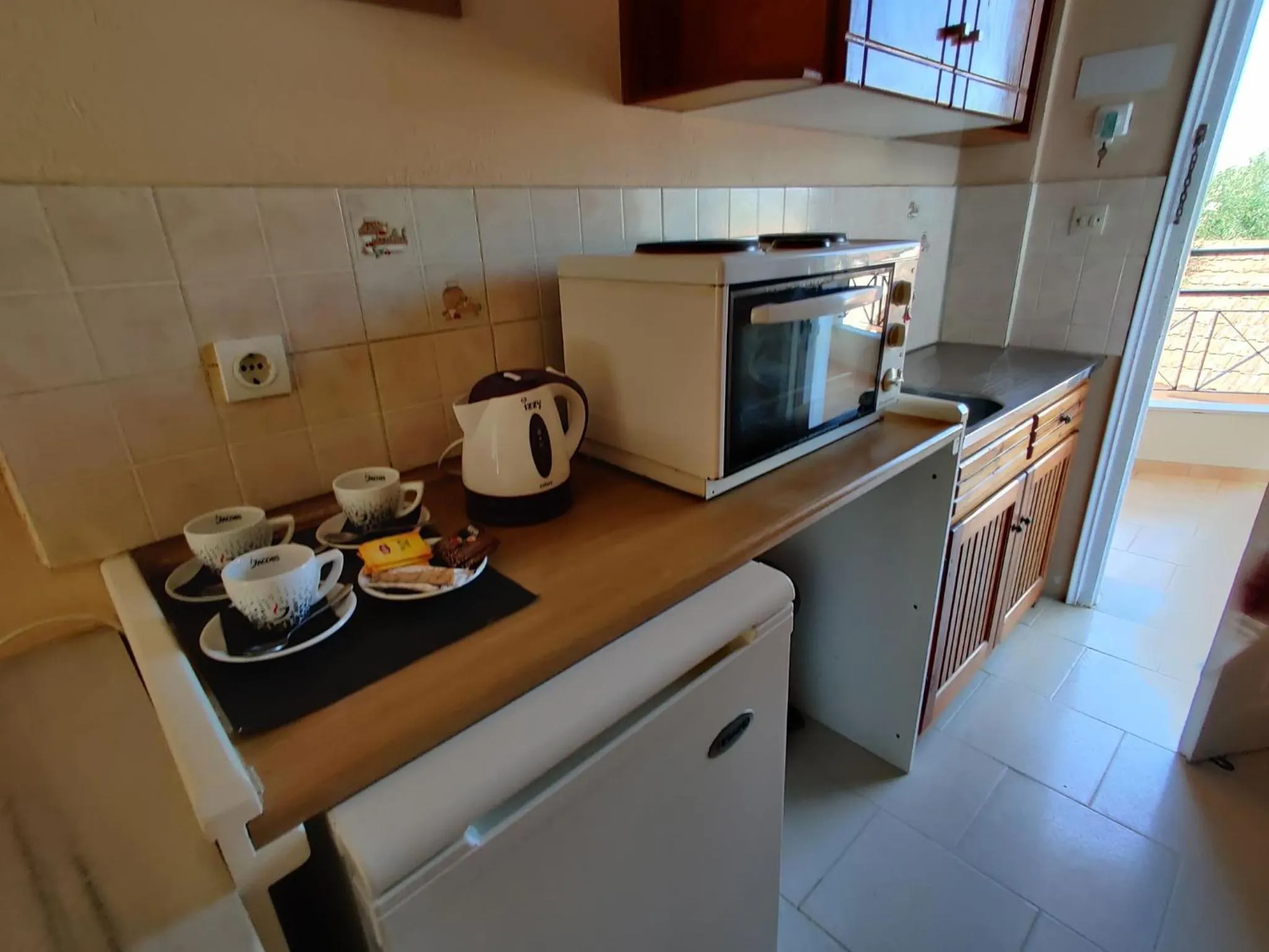 Kitchen or kitchenette in Kalypso studio Resorts