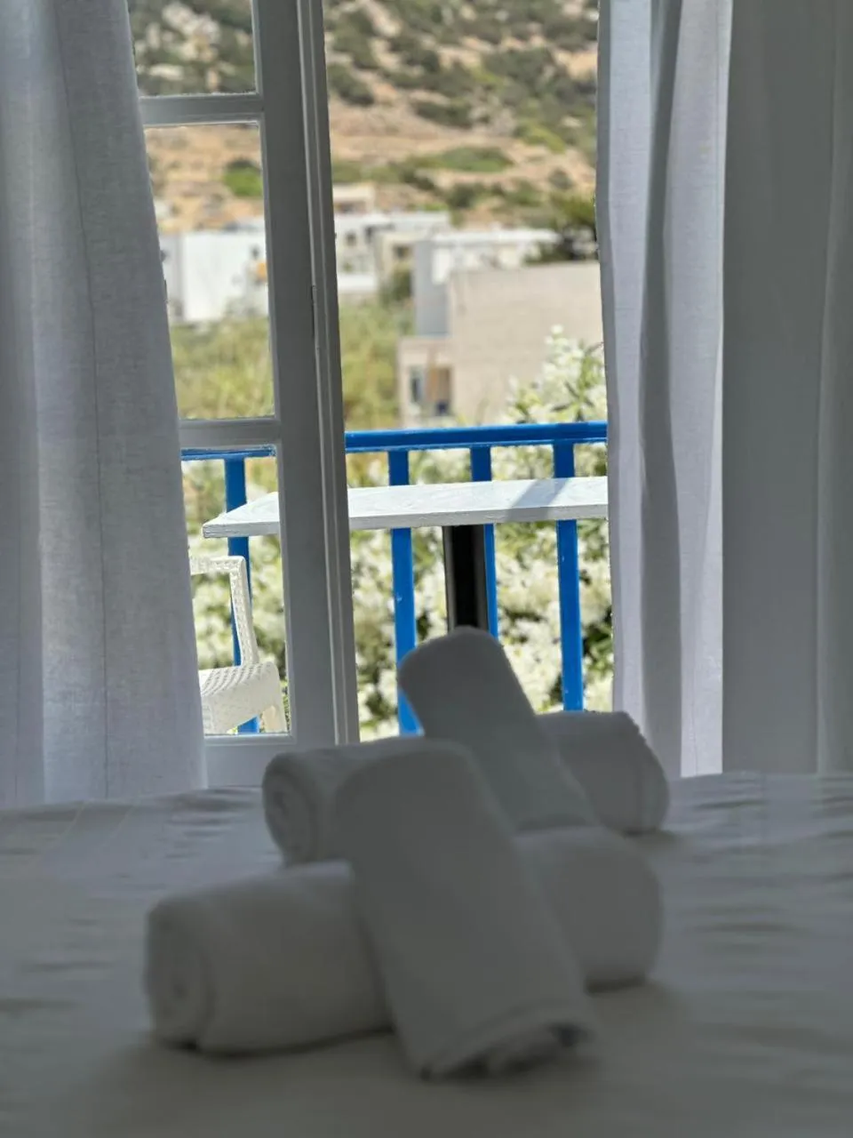 towels in Εvi Evan Hotel