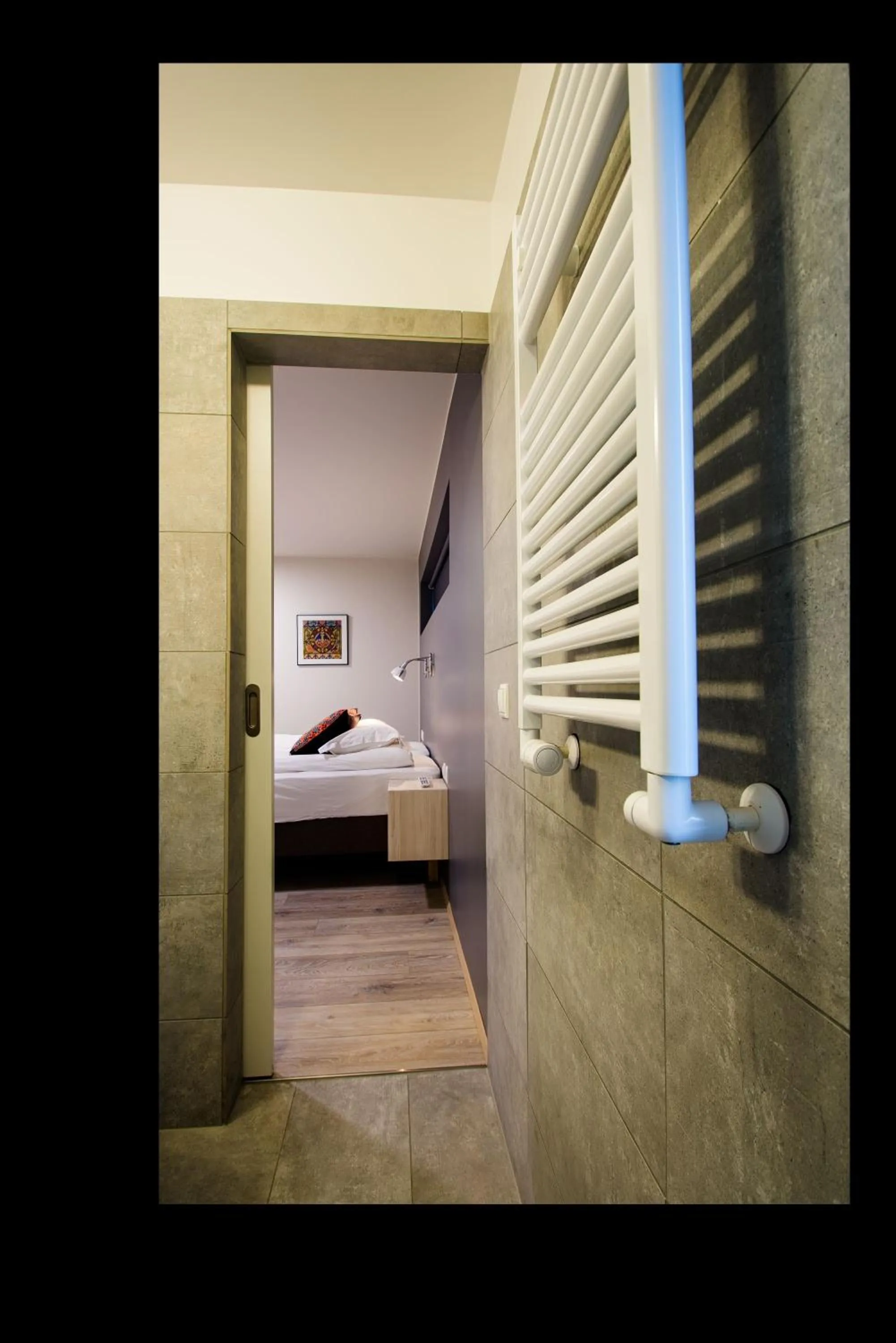 Bathroom, Bed in Brekkugerdi Guesthouse