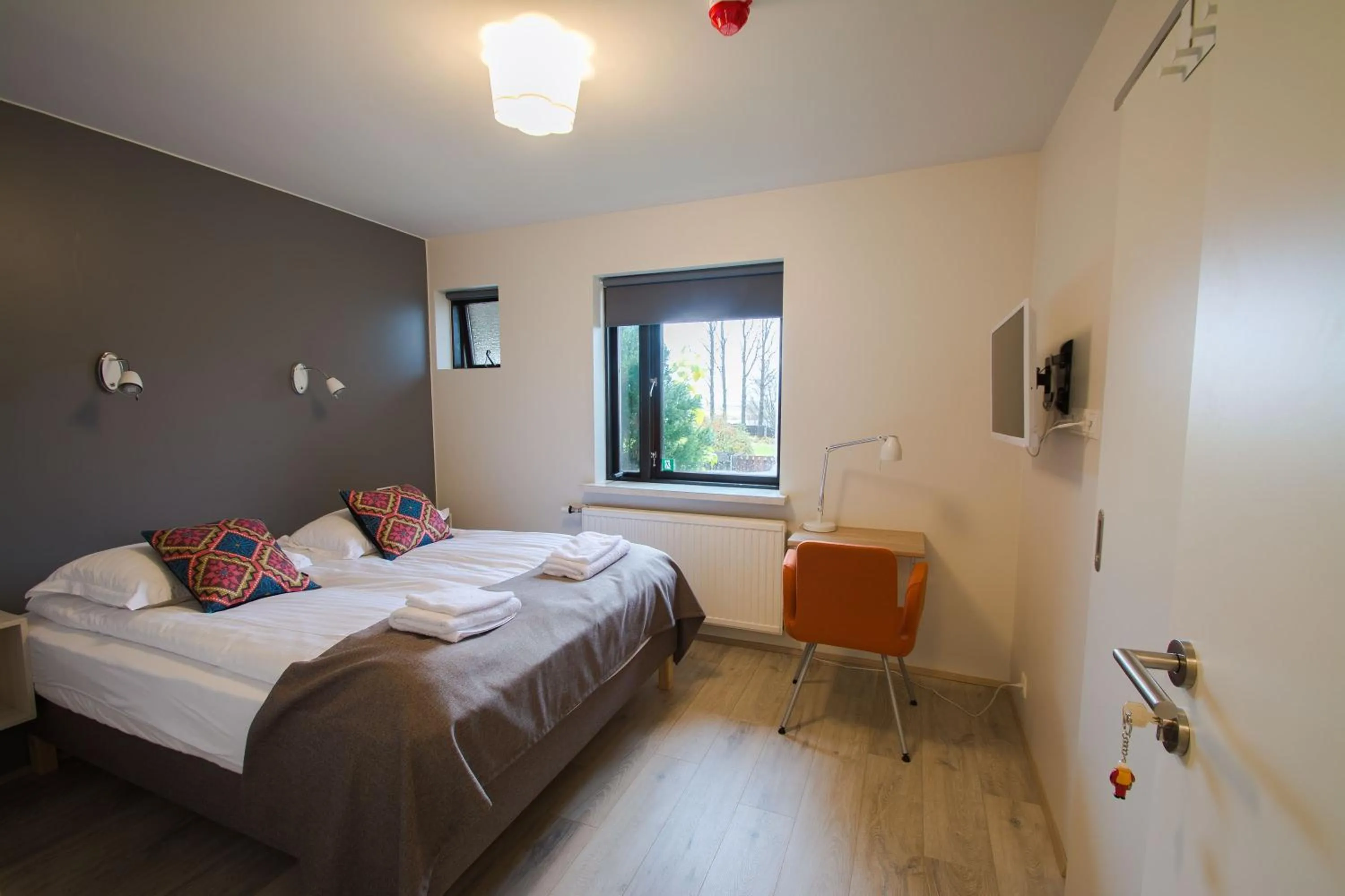 Bed in Brekkugerdi Guesthouse