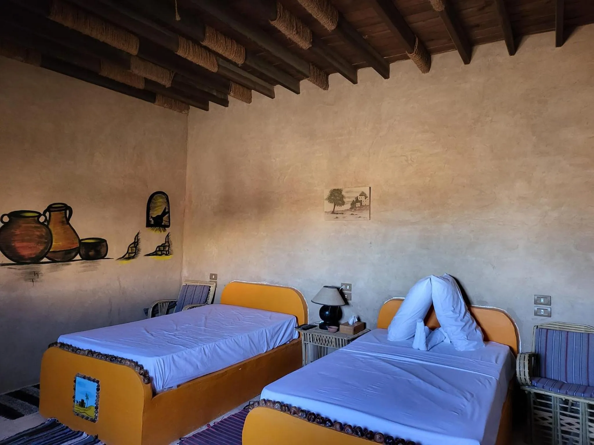 Bed in Qasr El Bagawat Hotel