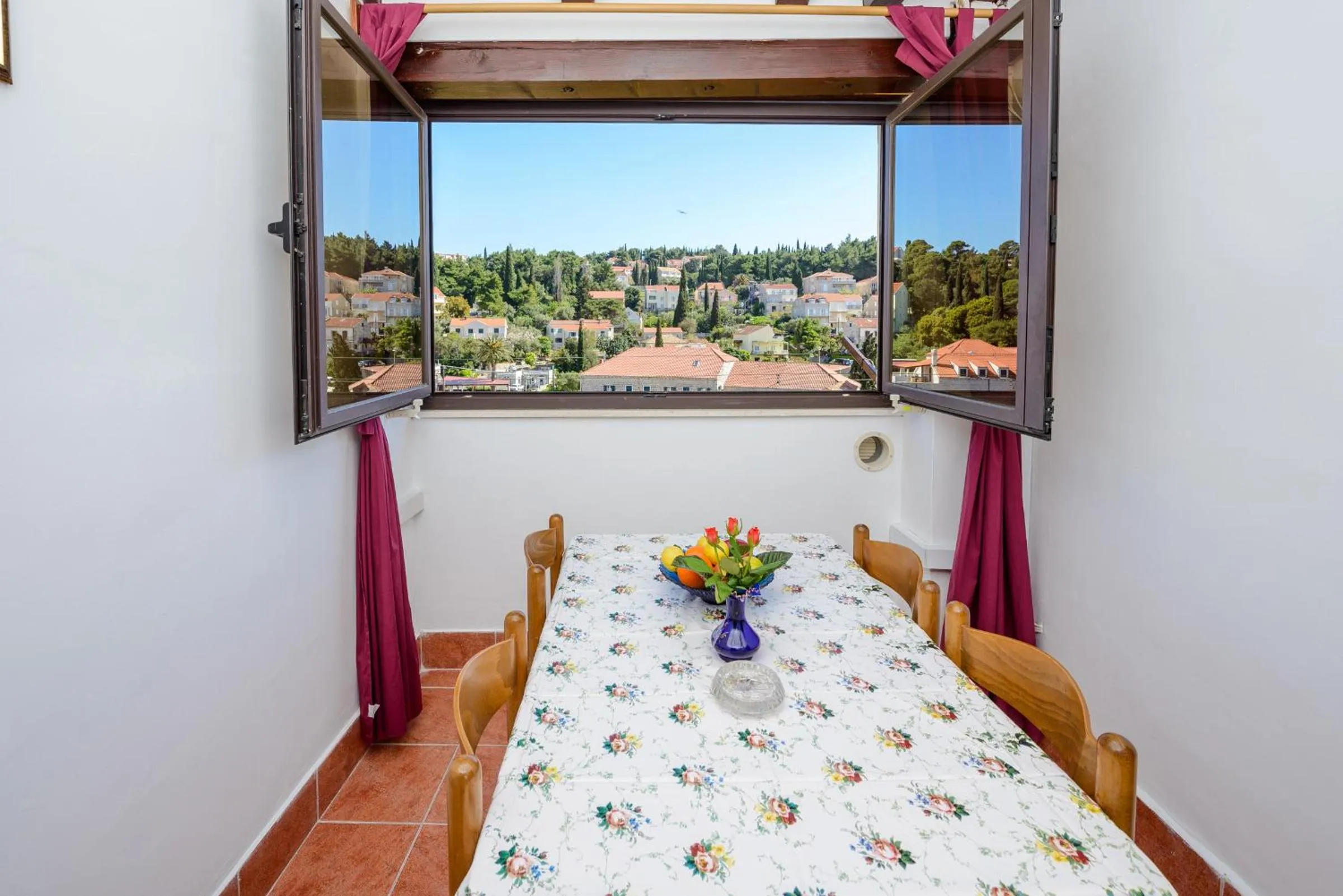 Dining area, Bed in Apartments & Rooms Mihajica