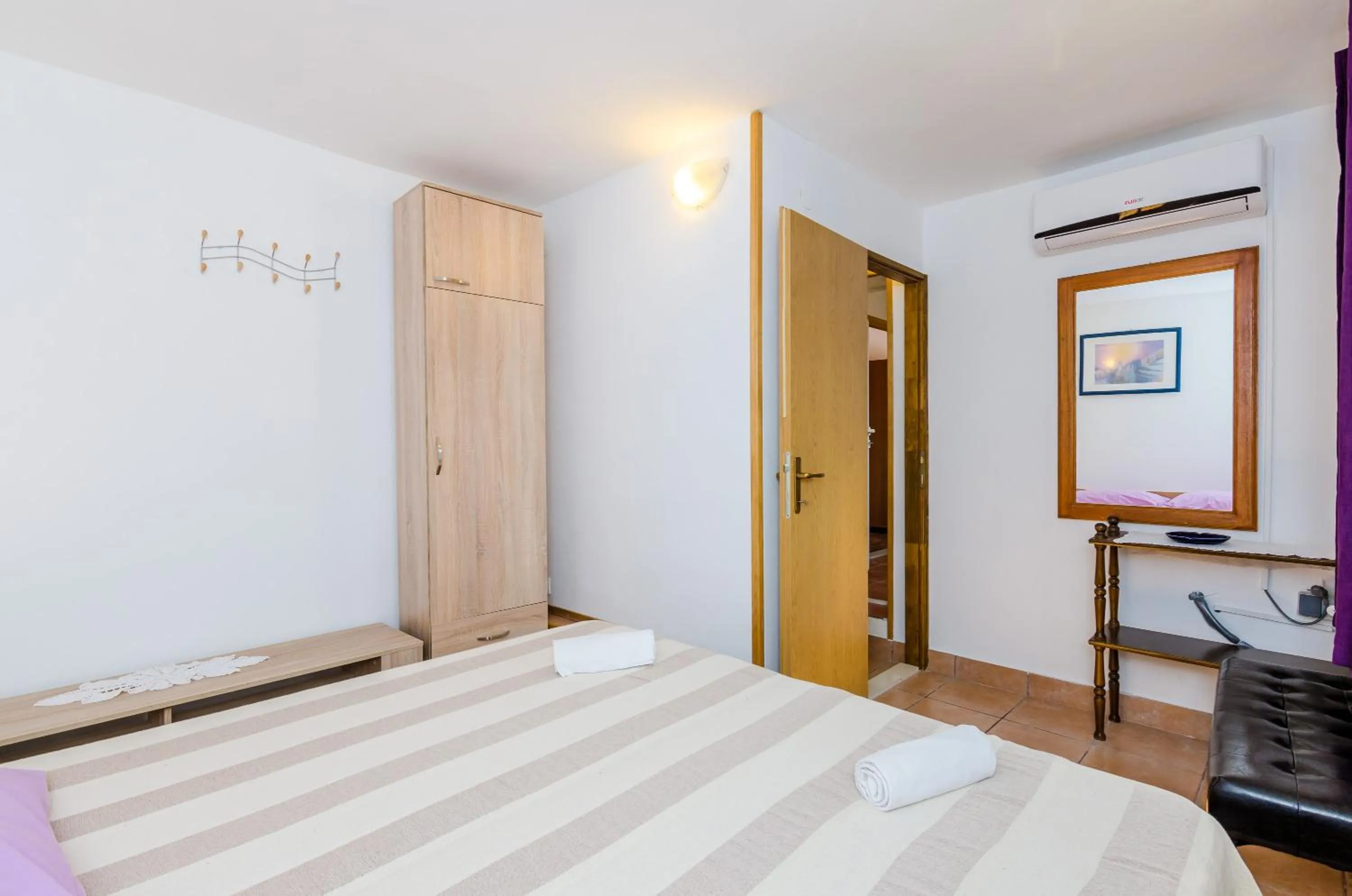 Bedroom, Bed in Apartments & Rooms Mihajica