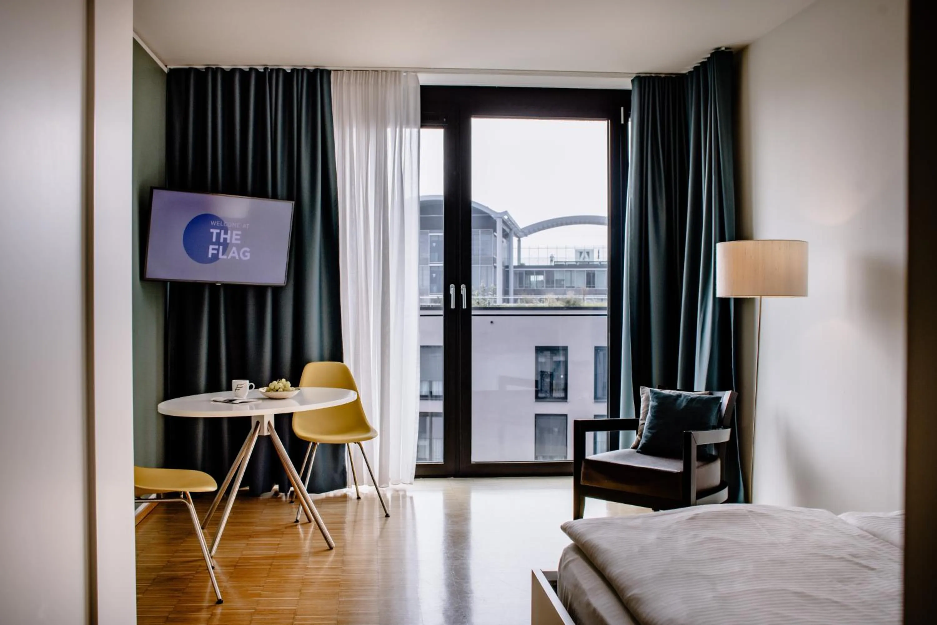 Photo of the whole room, Bed in THE FLAG München M.