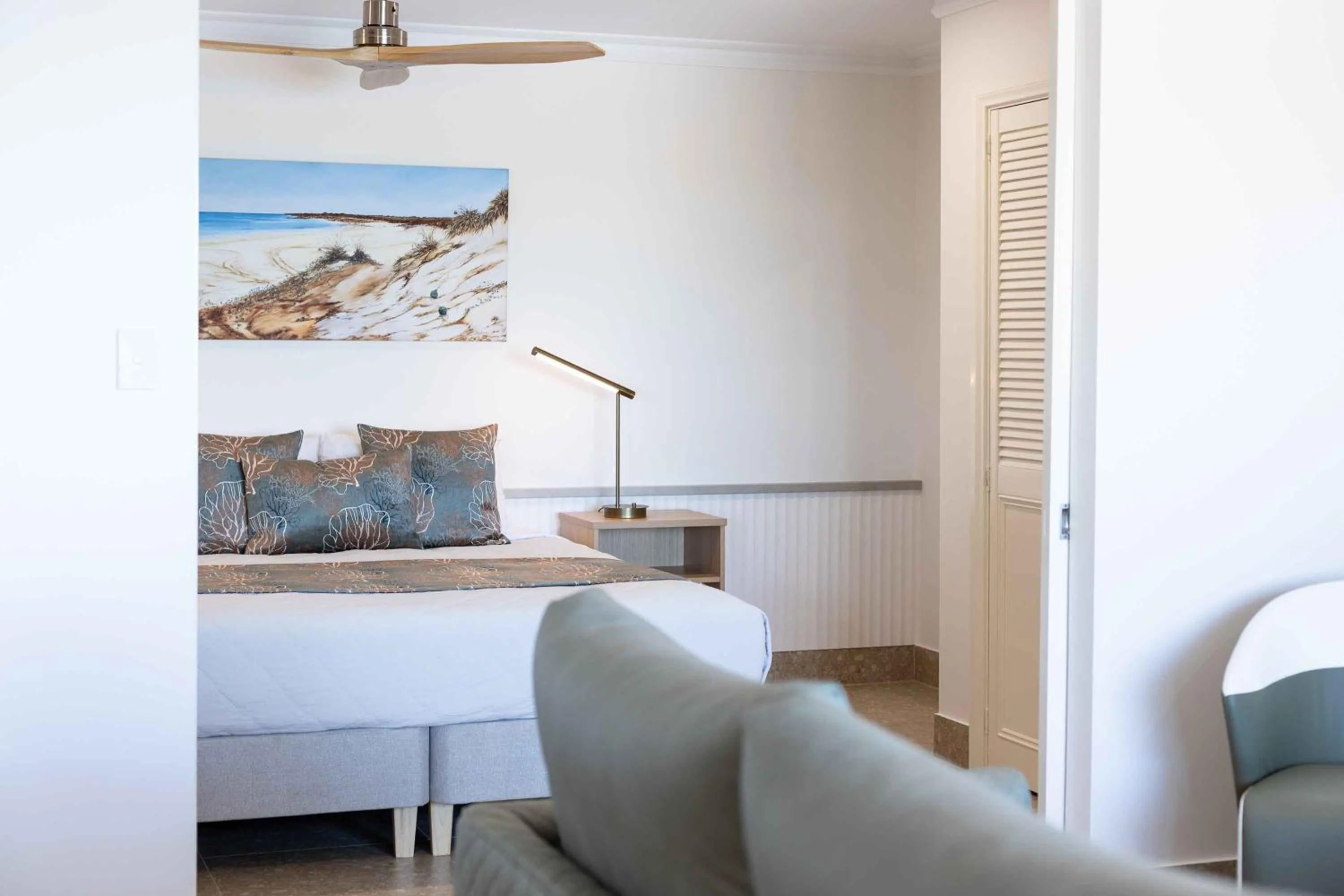 Bed in Moonlight Bay Suites