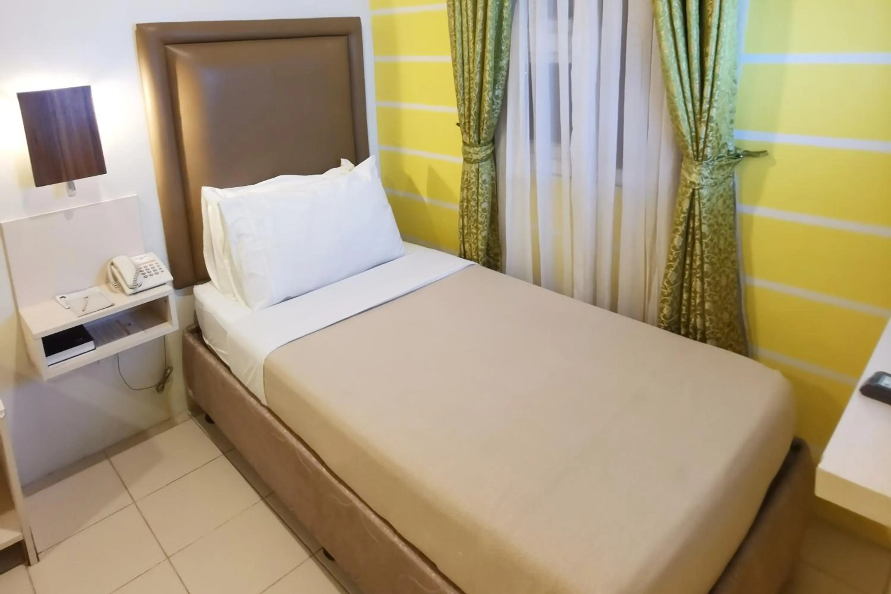 Bed in Cebu Uncle Toms Cabin Hotel powered by Cocotel