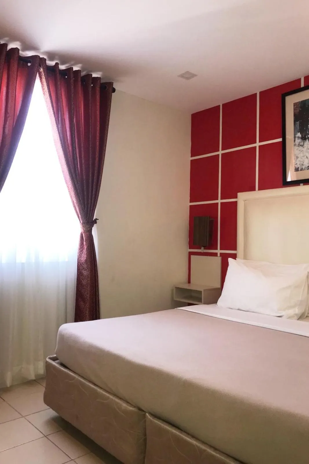 Bed in Cebu Uncle Toms Cabin Hotel powered by Cocotel