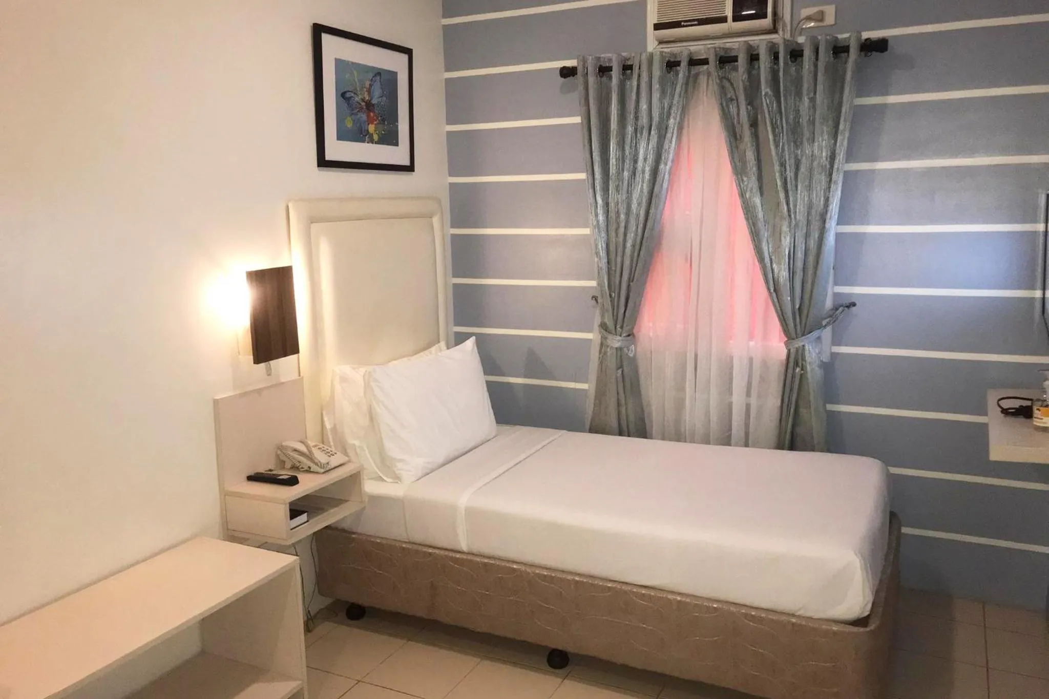 Bed in Cebu Uncle Toms Cabin Hotel powered by Cocotel