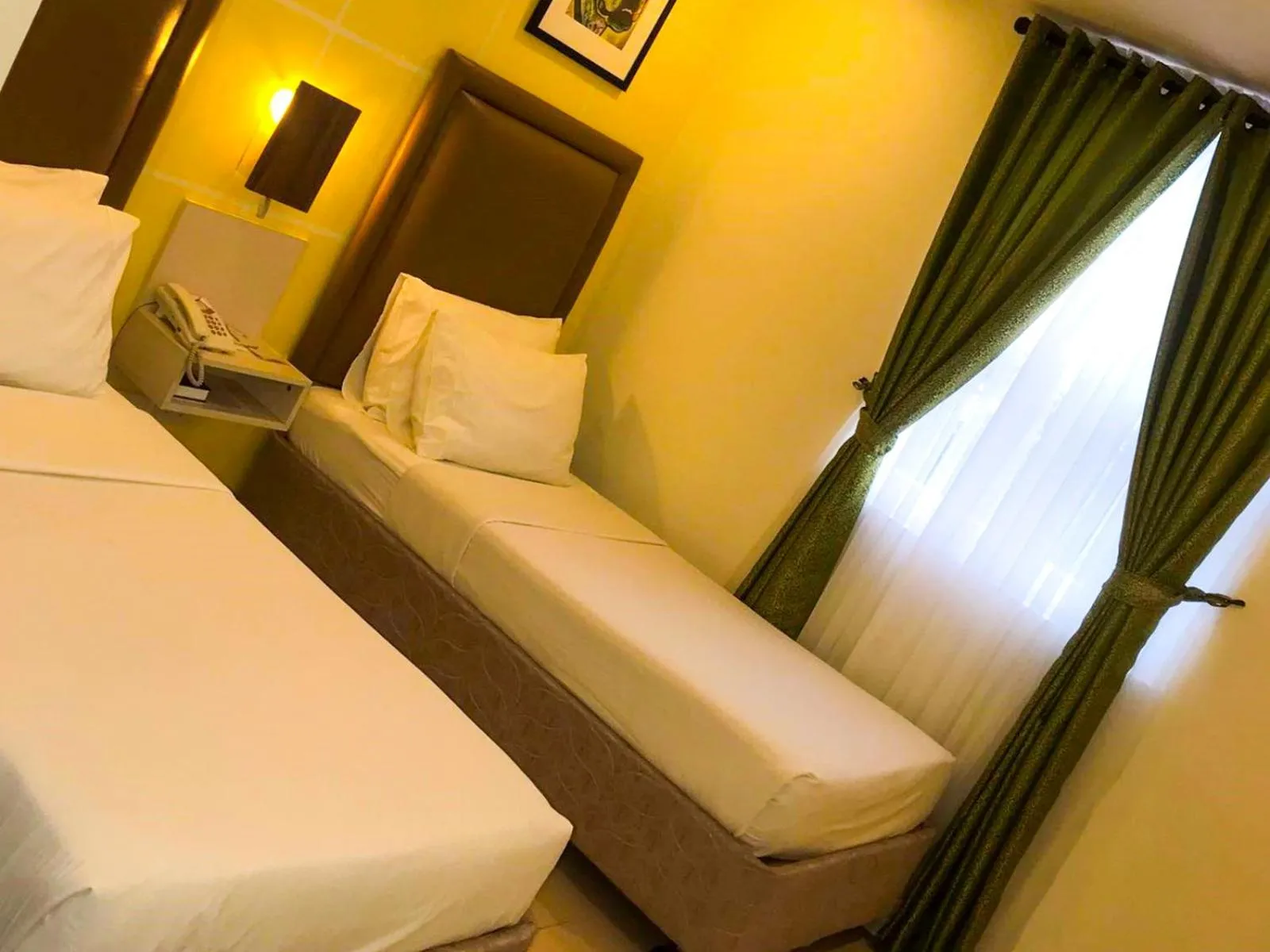 Bed in Cebu Uncle Toms Cabin Hotel powered by Cocotel