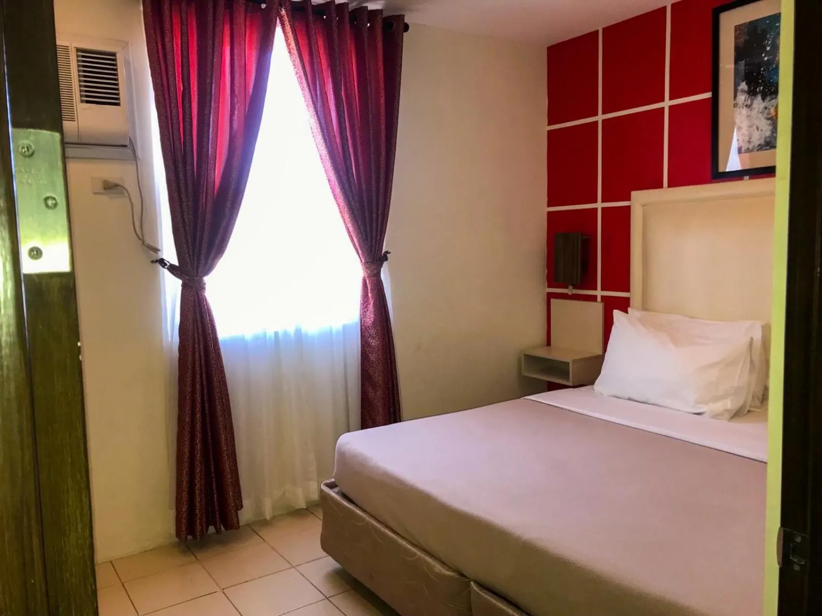 Bed in Cebu Uncle Toms Cabin Hotel powered by Cocotel
