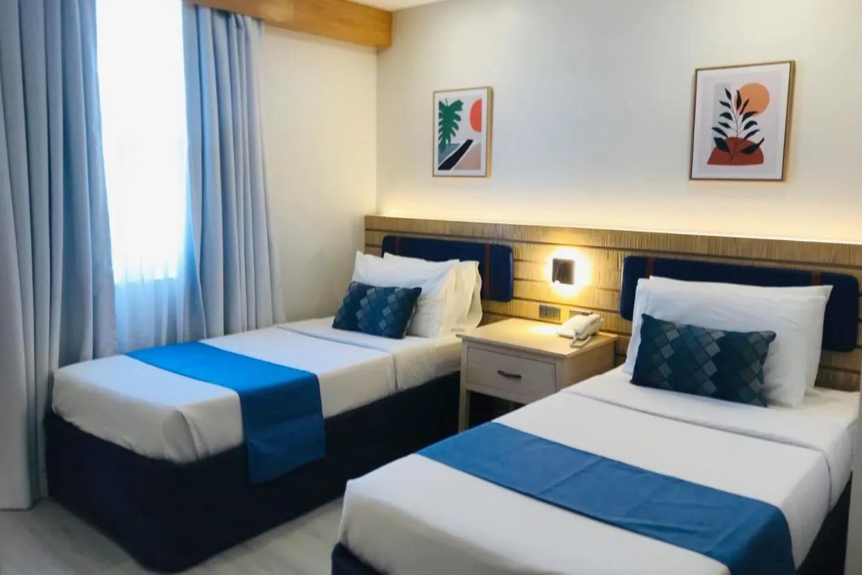 Bed in Cebu Uncle Toms Cabin Hotel powered by Cocotel