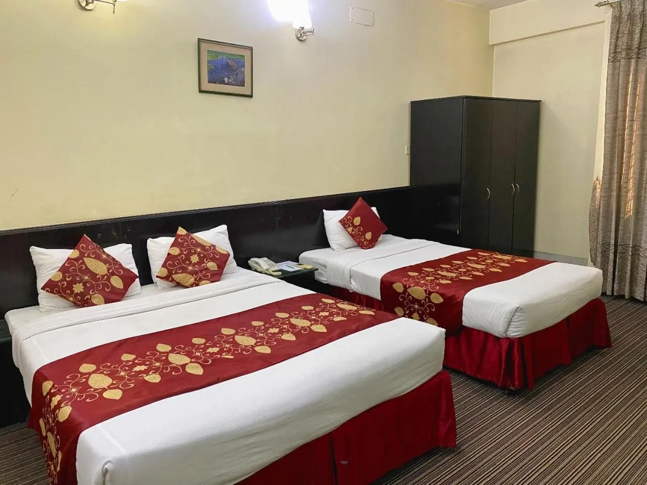 Bed in Quality Inn Dhaka