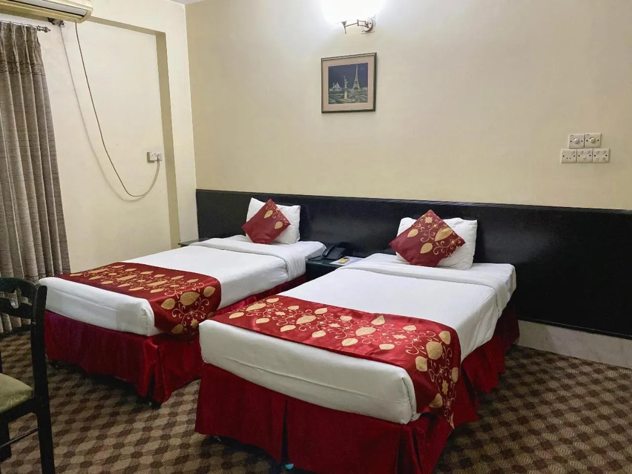 Bed in Quality Inn Dhaka