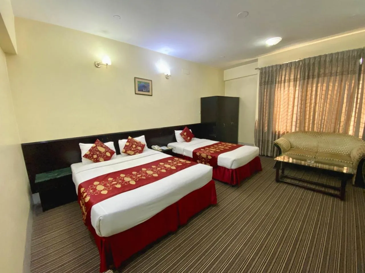 Bed in Quality Inn Dhaka