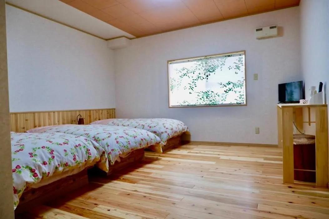 Bed in Yakushima Pension Ichigoichie