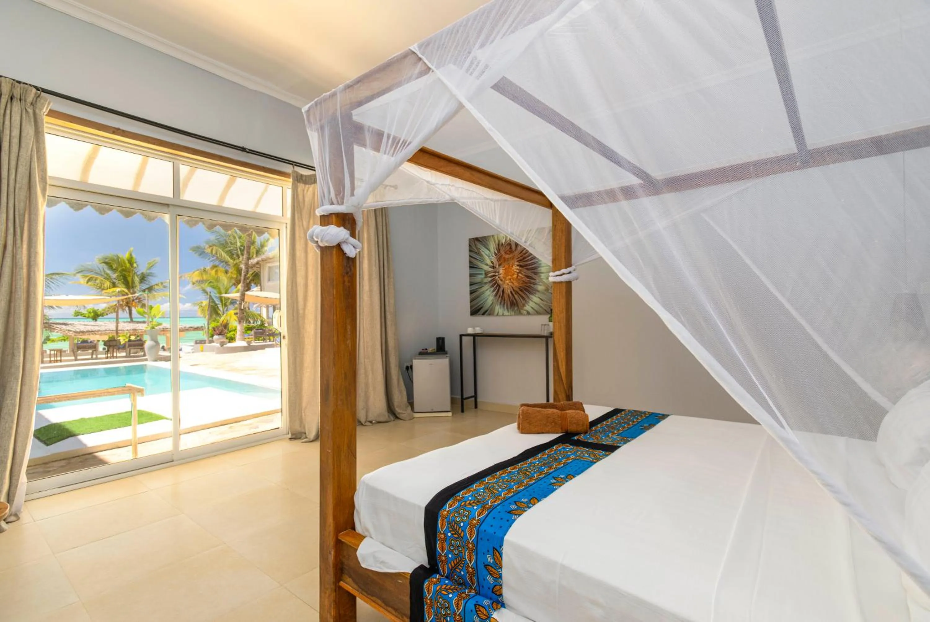 Bed in Paje Beach Apartments & Hotel