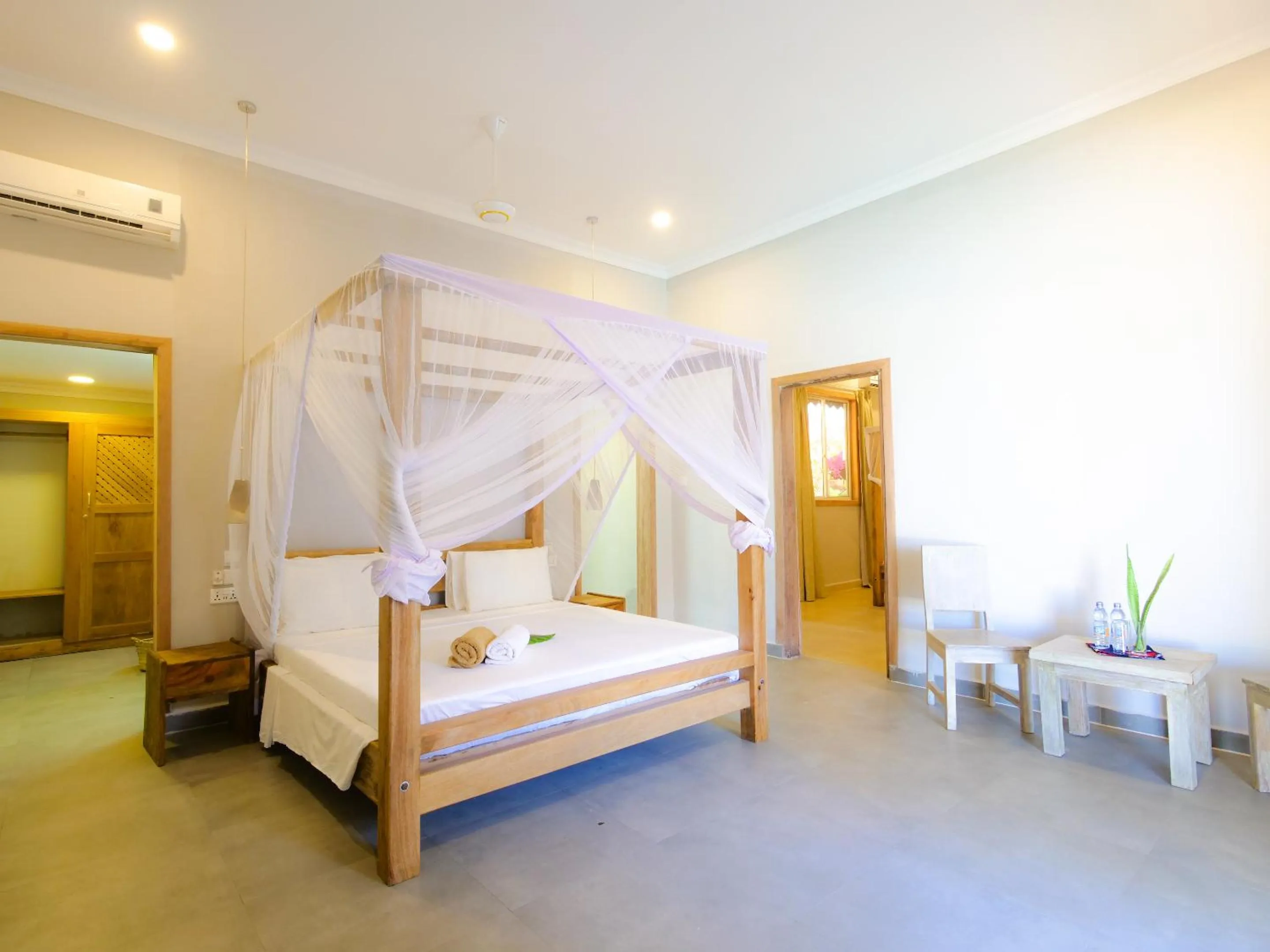 Bed in Paje Beach Apartments & Hotel