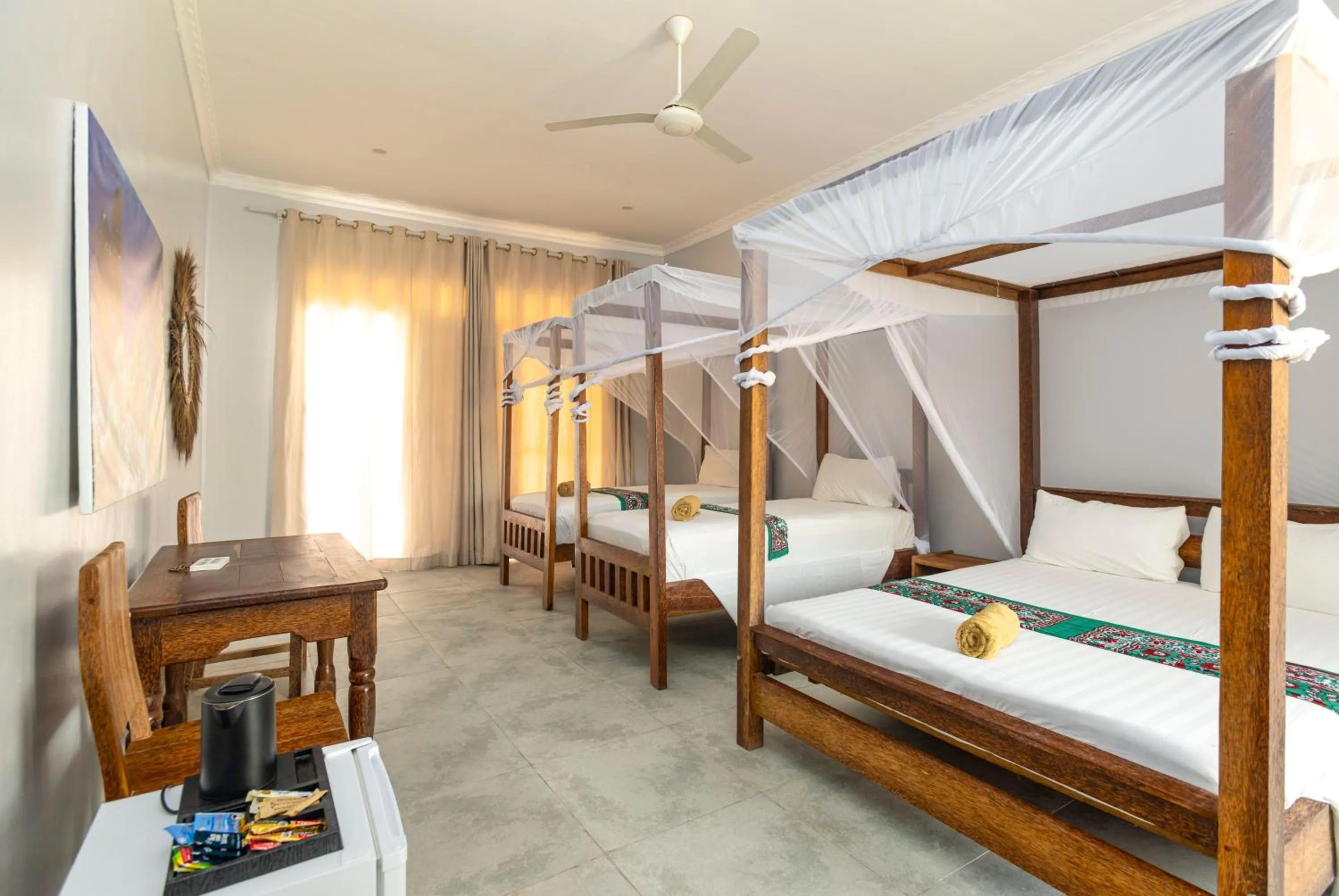Bed in Paje Beach Apartments & Hotel