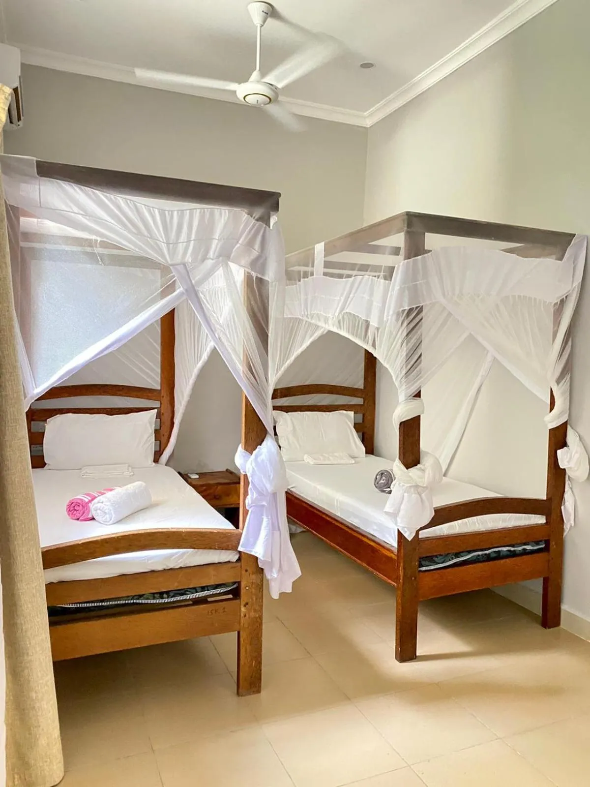 Bed in Paje Beach Apartments & Hotel