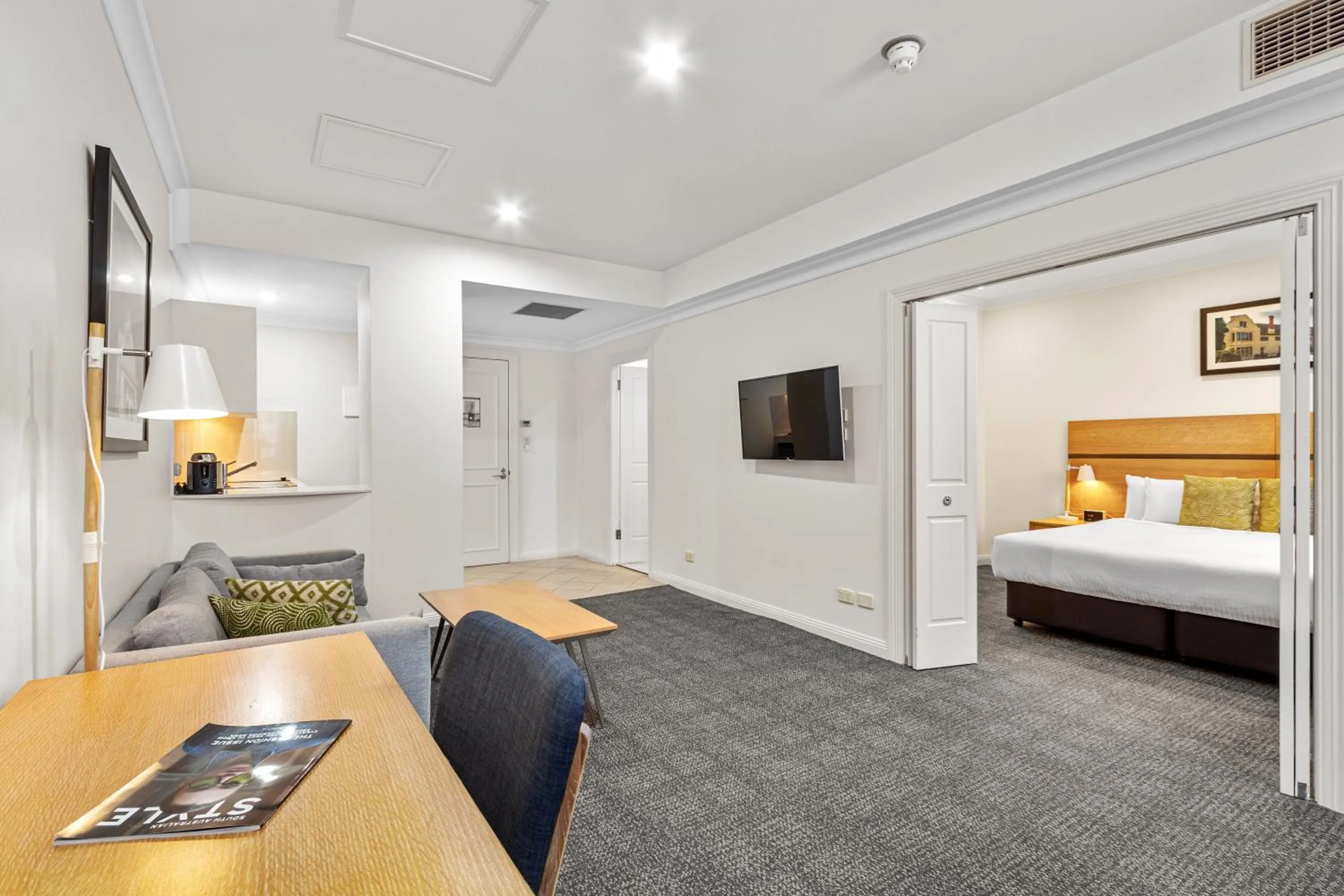 Living room, Bed in Quality Apartments Adelaide Central