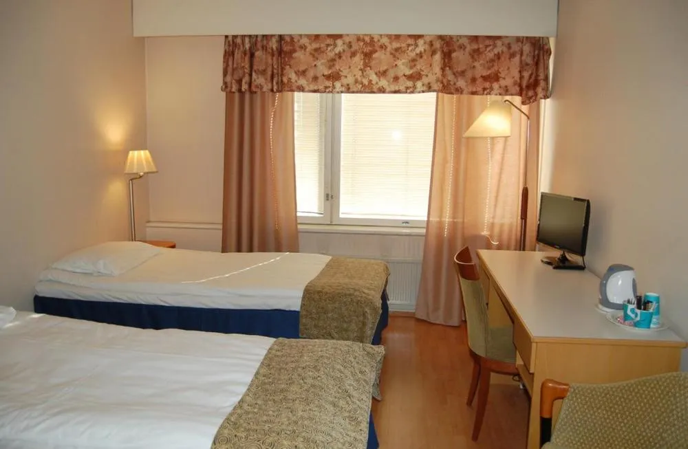 Photo of the whole room, Bed in Hotel Hirvi