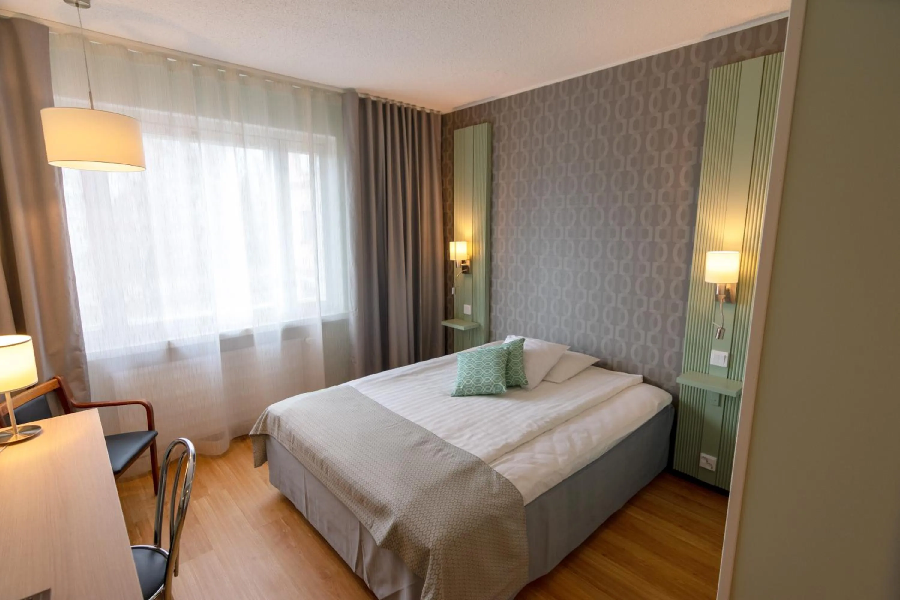 Photo of the whole room, Bed in Hotel Hirvi