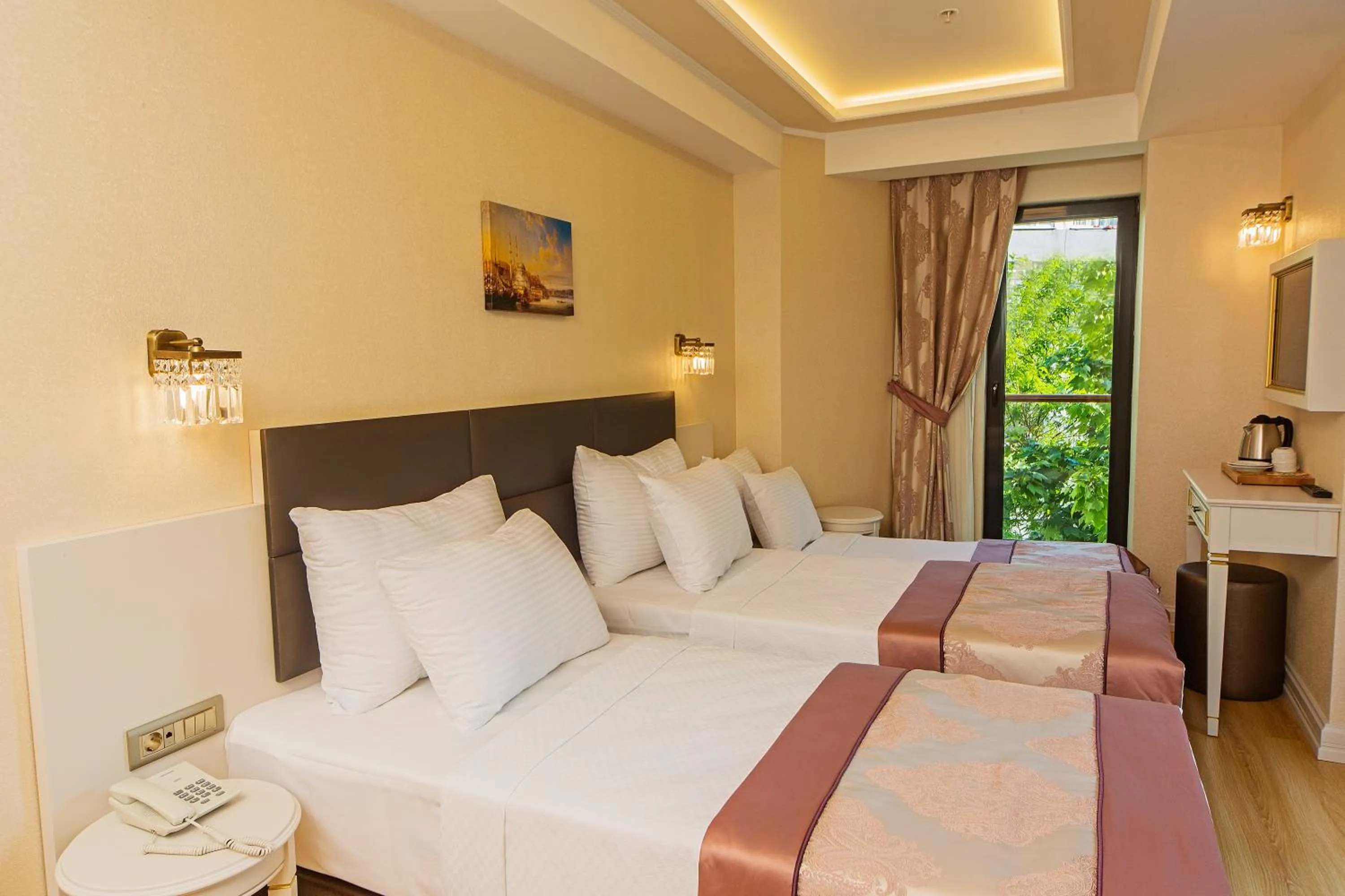 Bed in Grand Naki Hotel