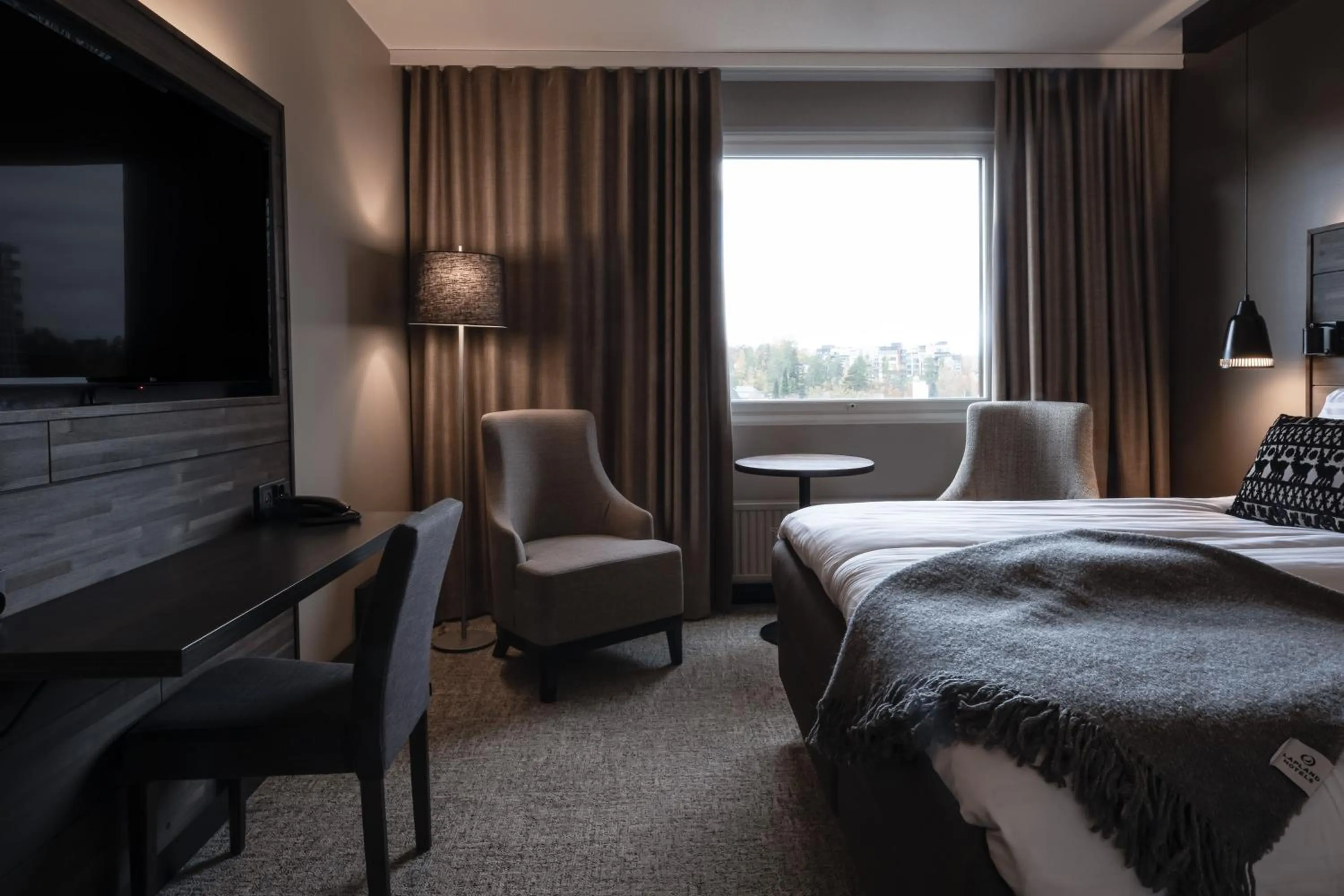 Photo of the whole room, Bed in Lapland Hotels Kuopio