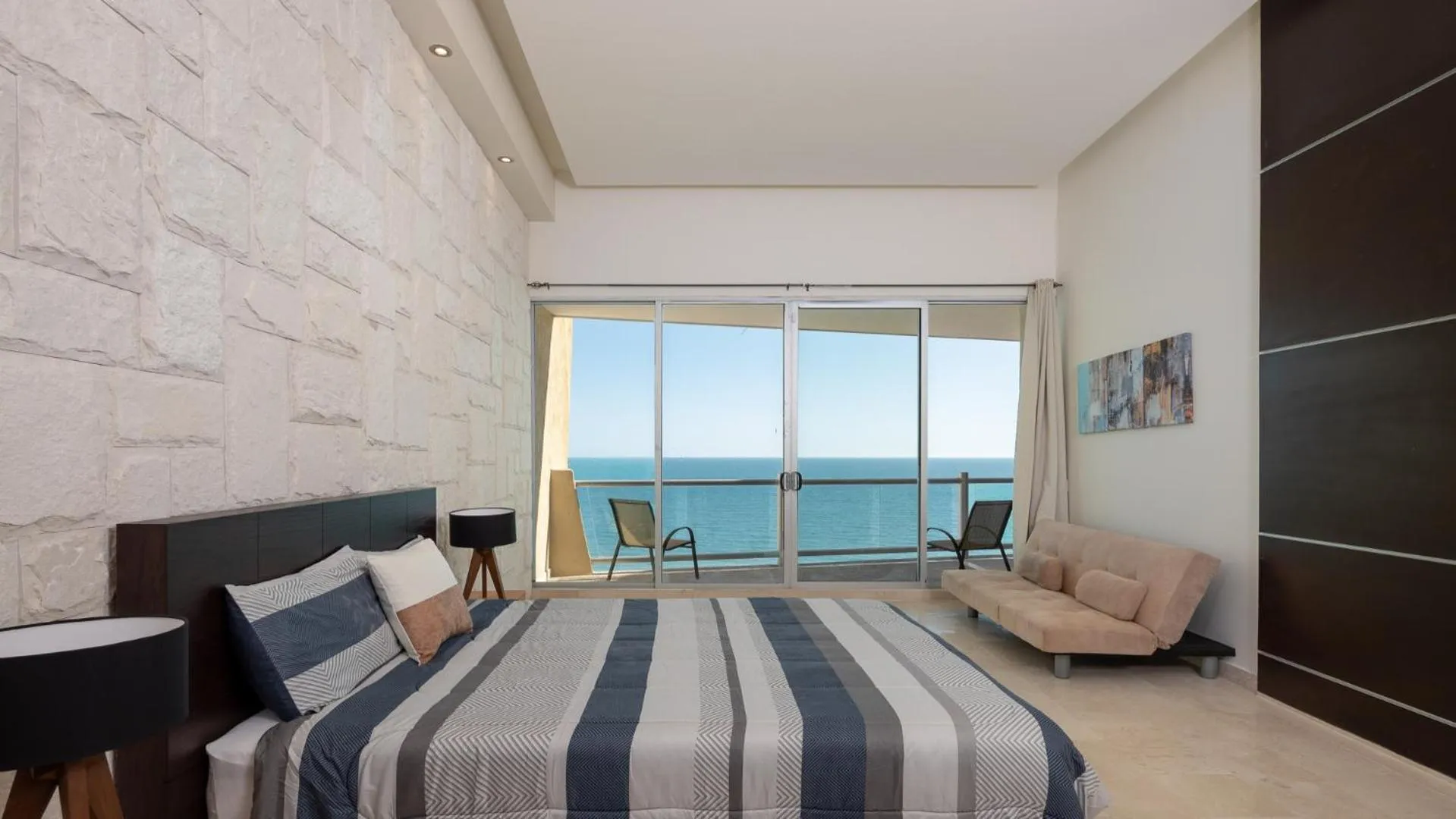 Photo of the whole room, Bed in Encanto Living Penthouse by Kivoya