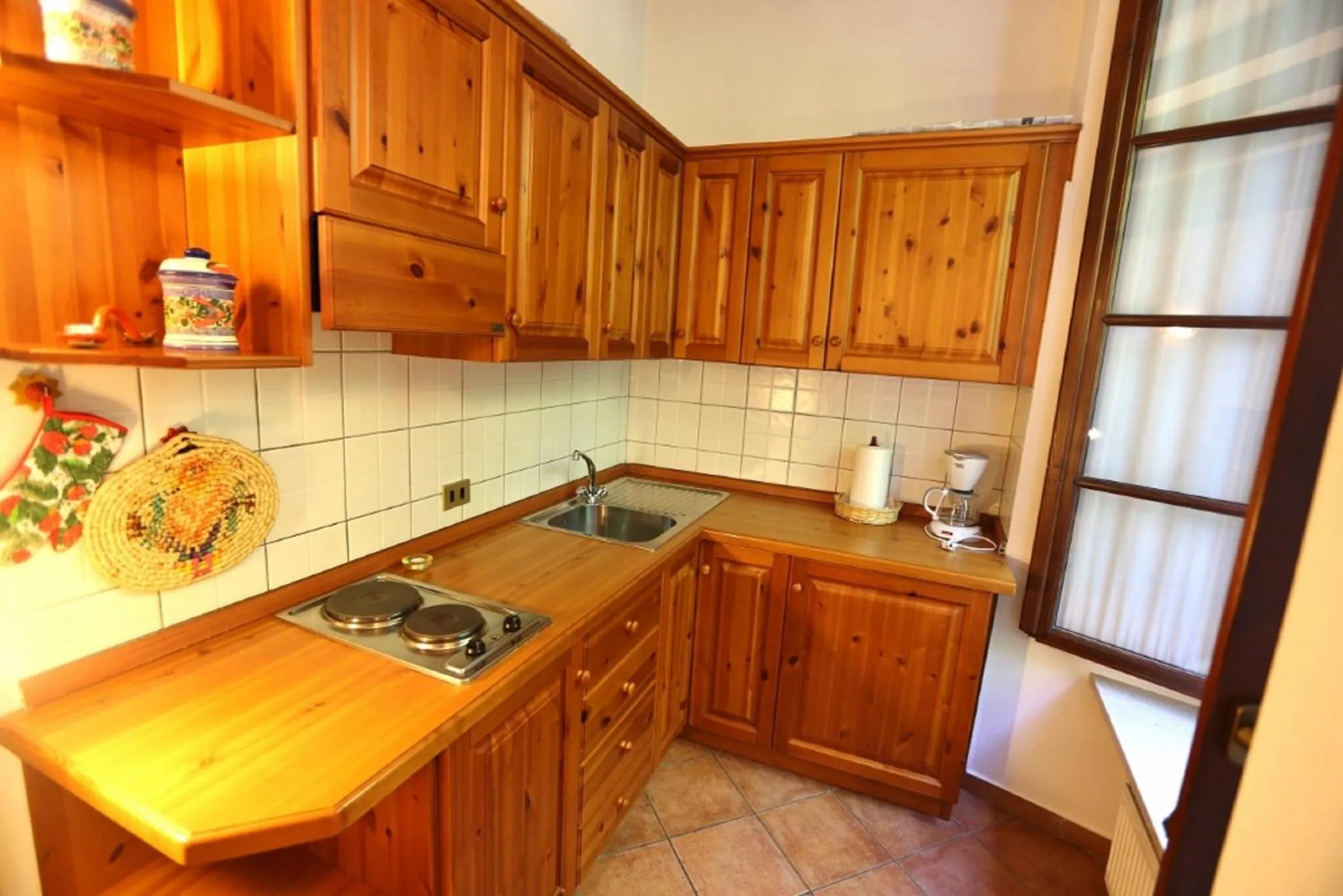 Kitchen or kitchenette in Casa Cannobio