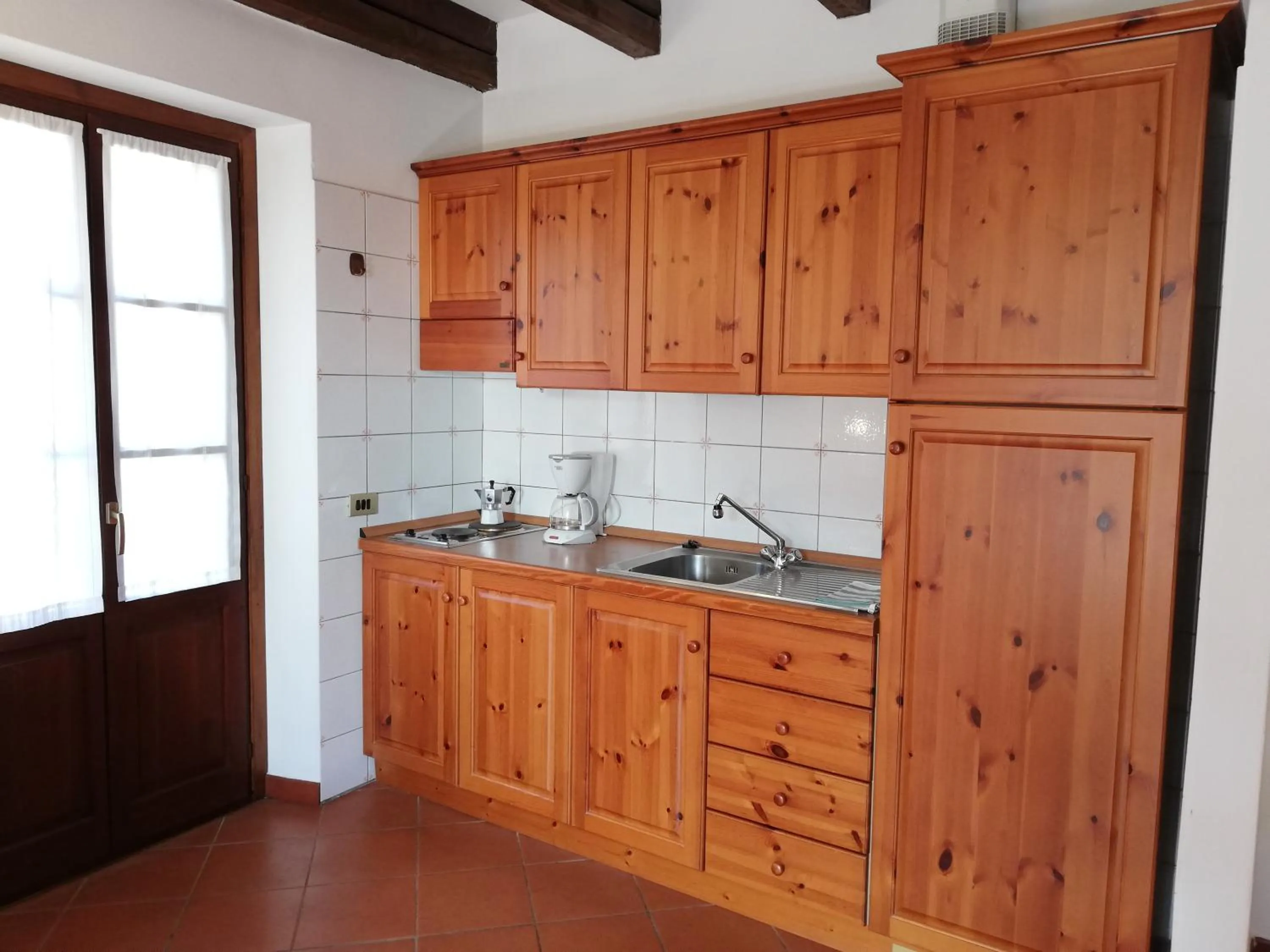 Kitchen or kitchenette in Casa Cannobio