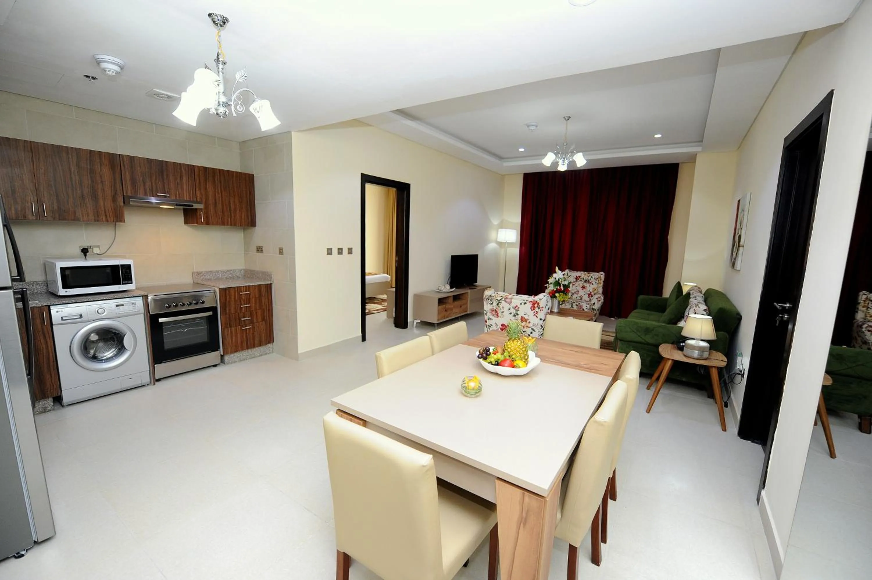 Kitchen or kitchenette in Al Mansour Park Inn Hotel&Apartment